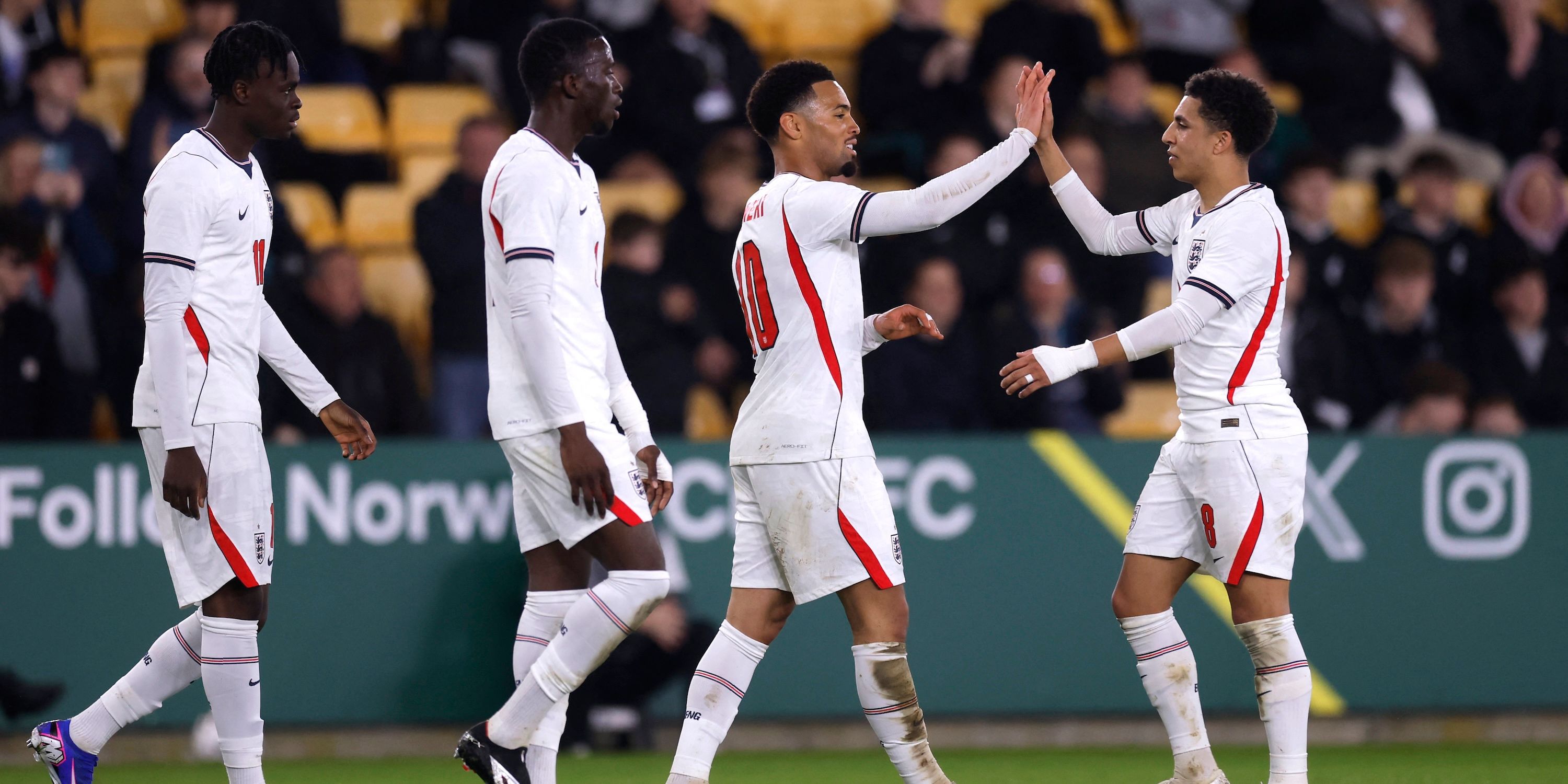 England's Ethan Nwaneri celebrates scoring their third goal with teammates 