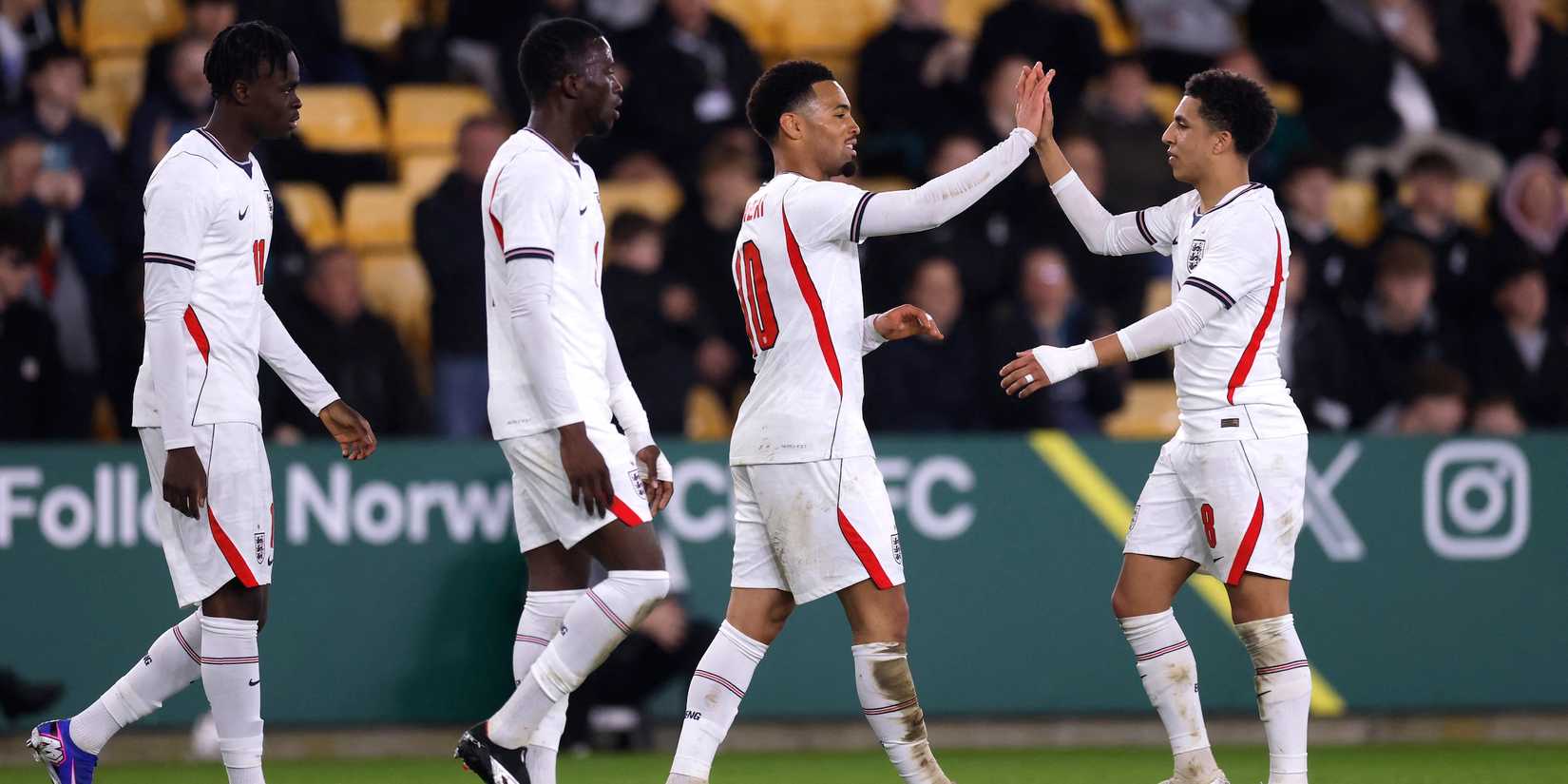 England's Ethan Nwaneri celebrates scoring their third goal with teammates 