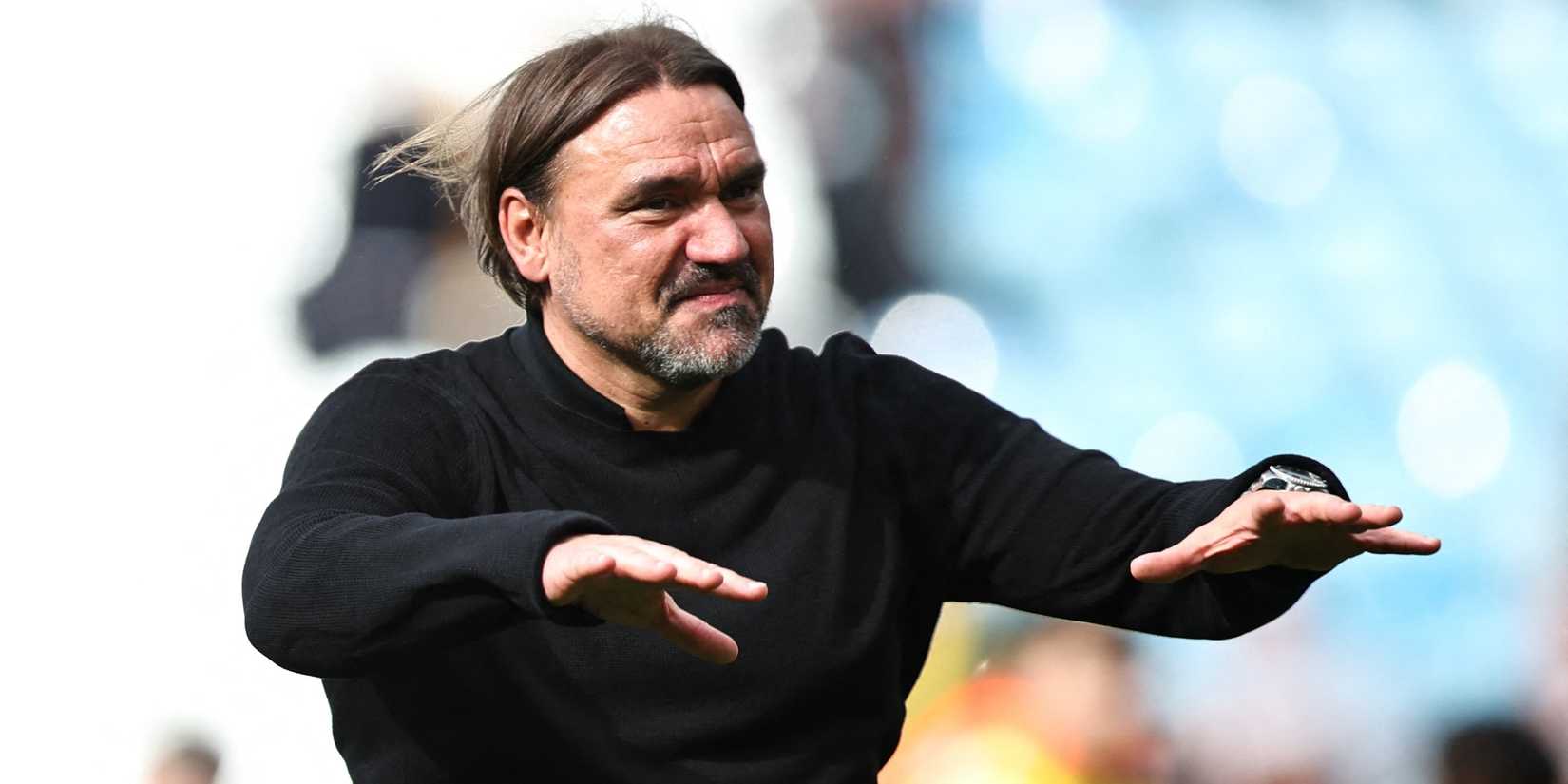 Leeds United manager Daniel Farke gestures to the fans at the end of the match
