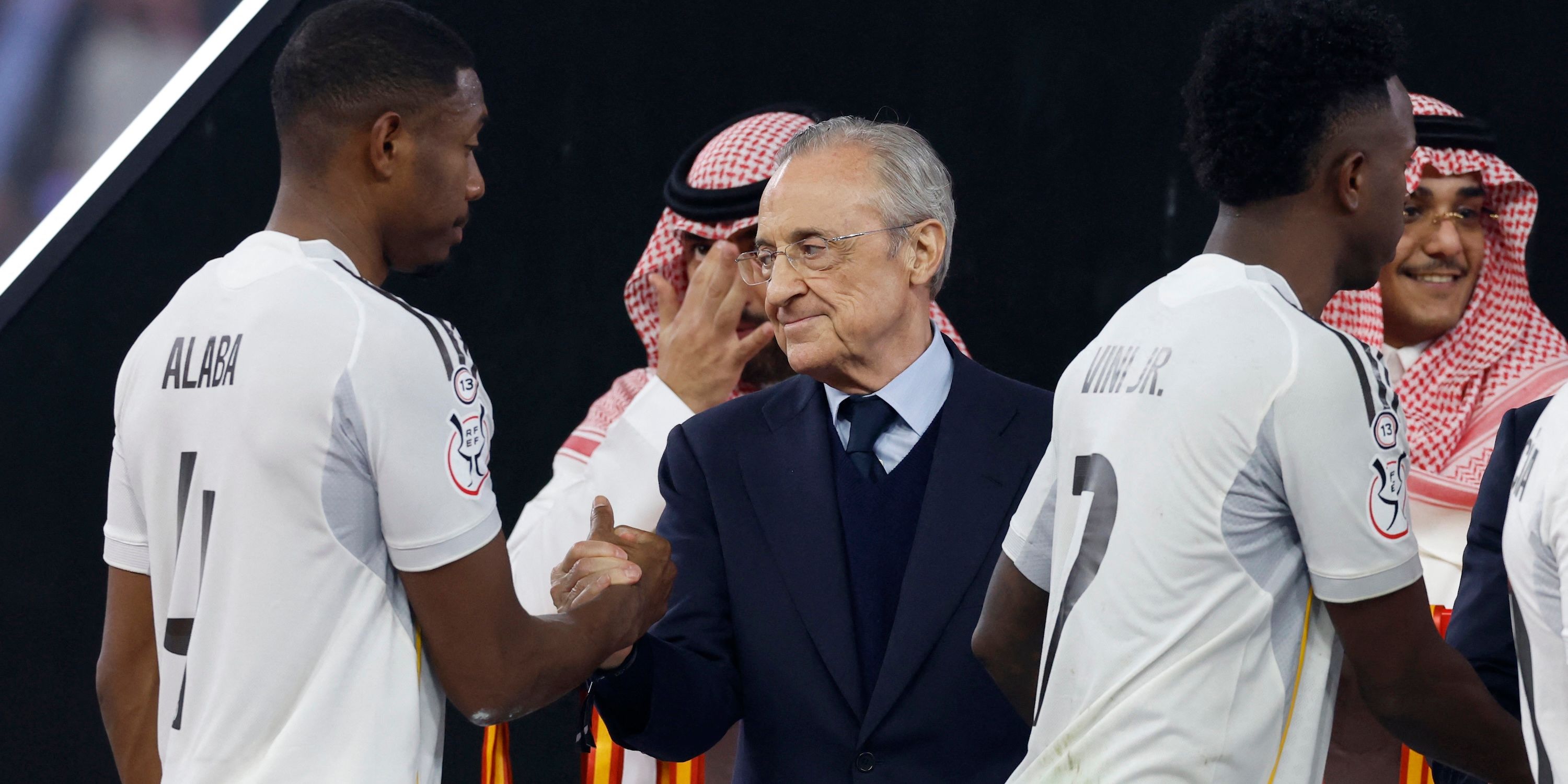     Real Madrid president Florentino Perez shakes hands with Real Madrid's David Alaba