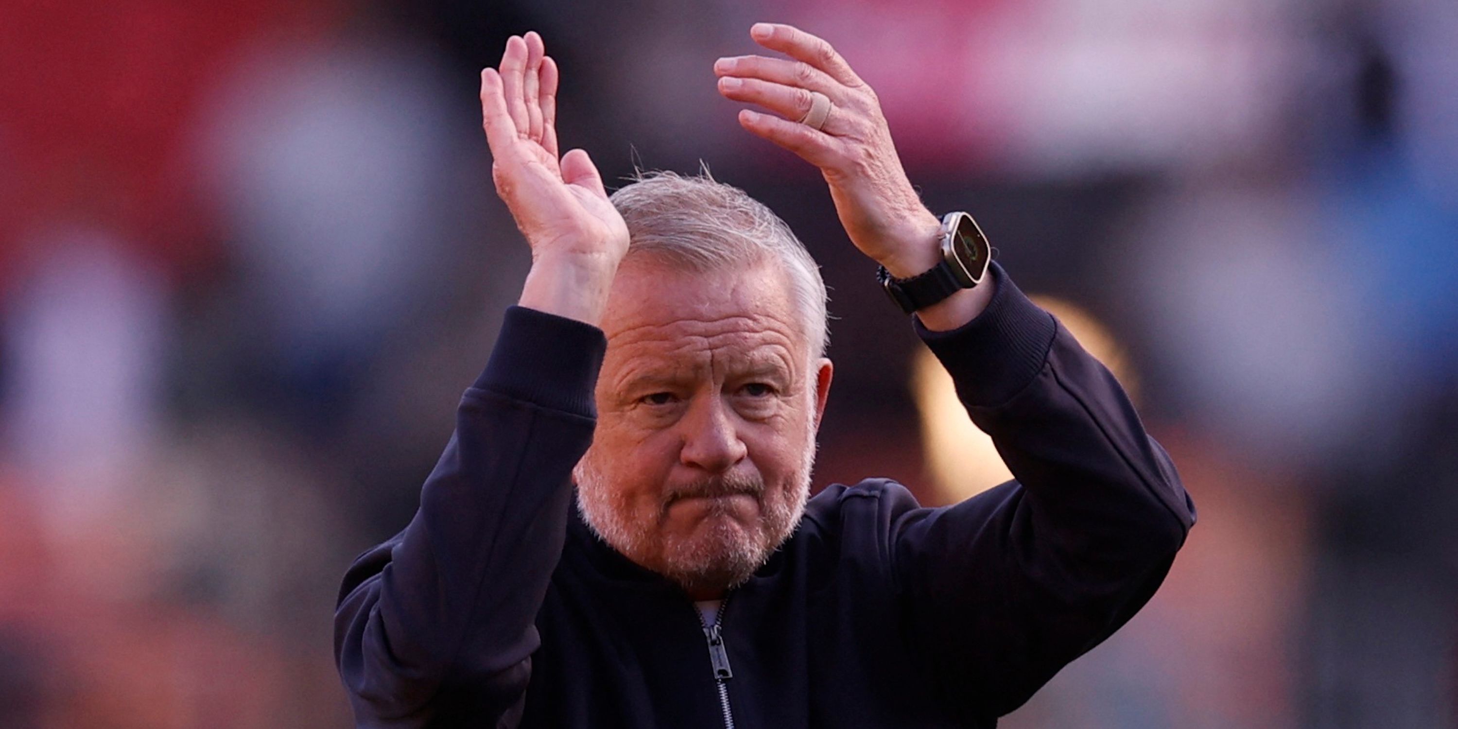 Sheffield United manager Chris Wilder applauds fans after the match