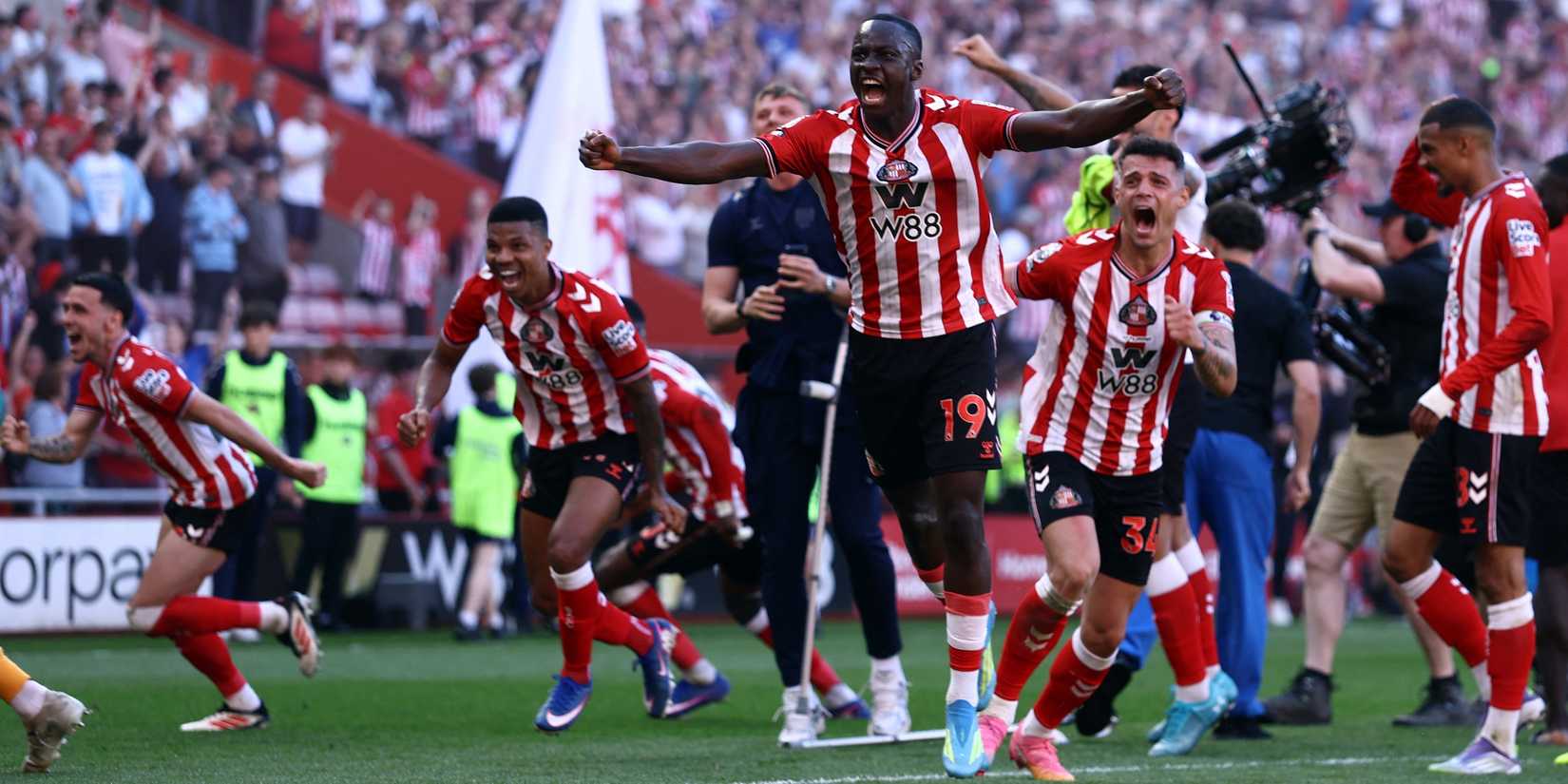 Sunderland's Habib Diarra and teammates celebrate after the match