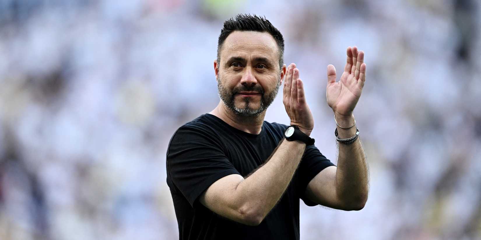 Tottenham Hotspur manager Roberto De Zerbi applauds fans after the match