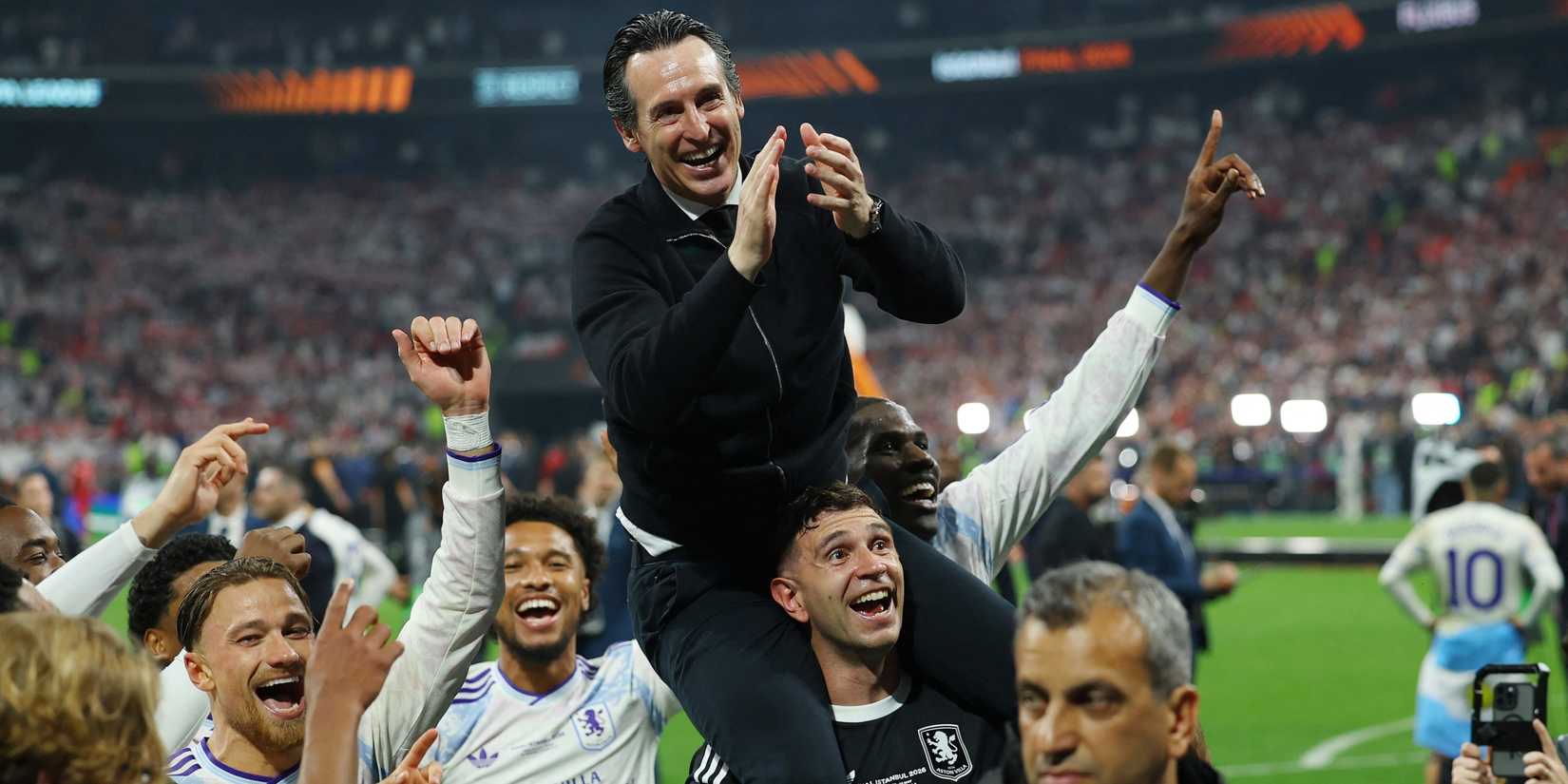 Aston Villa manager Unai Emery, Emiliano Martinez and Matty Cash celebrate after winning the UEFA Europa League