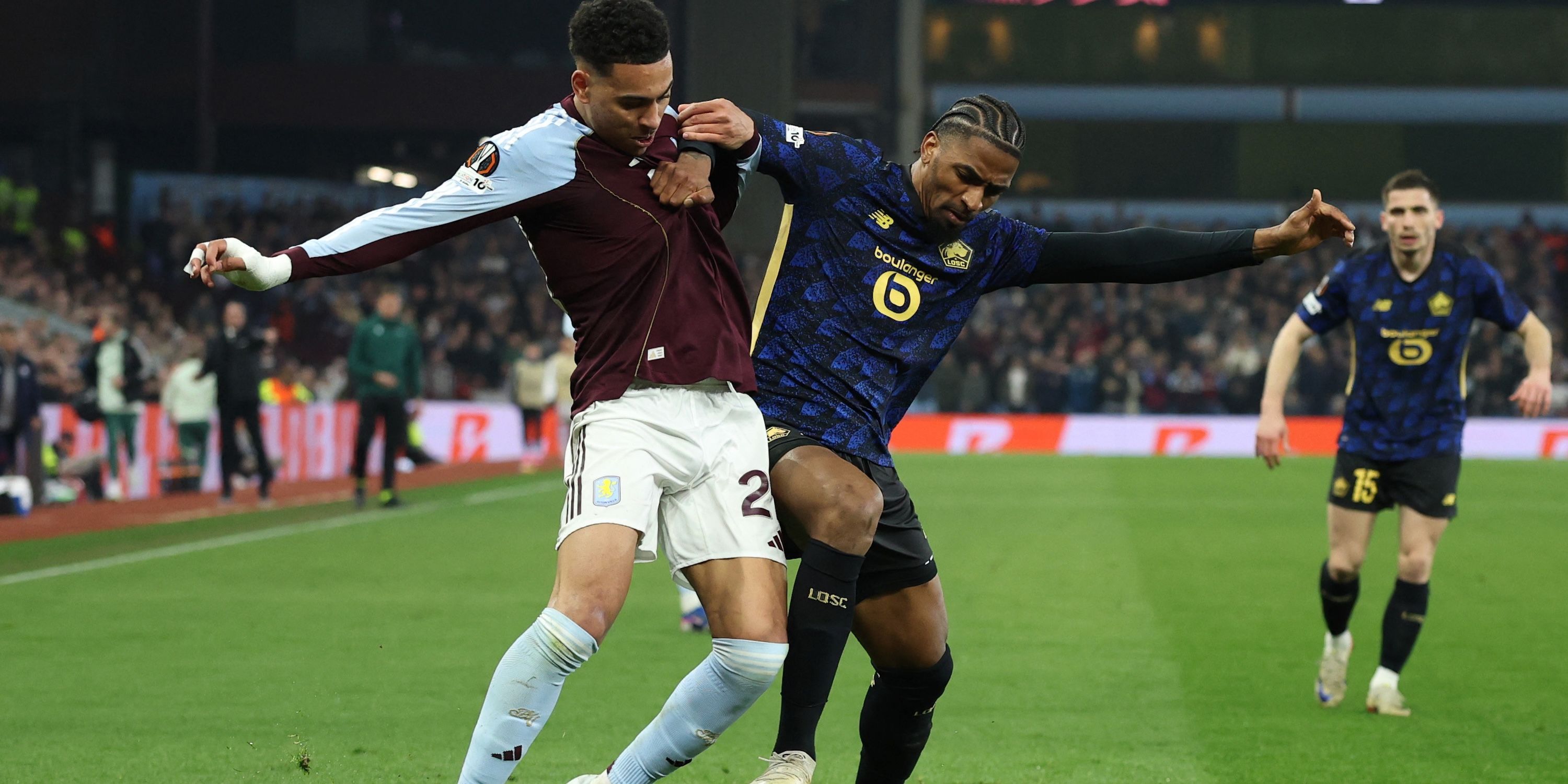 Aston Villa's Morgan Rogers in action with Lille's Alexsandro