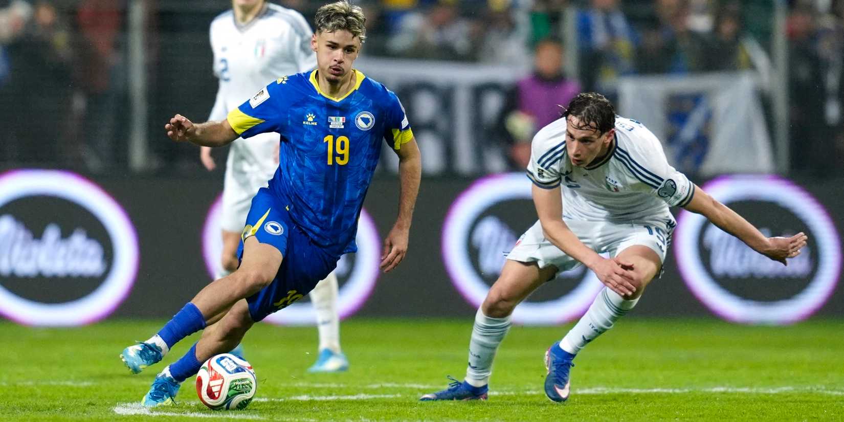 Bosnia and Herzegovina's Kerim-Sam Alajbegovic in action with Italy's Pio Esposito