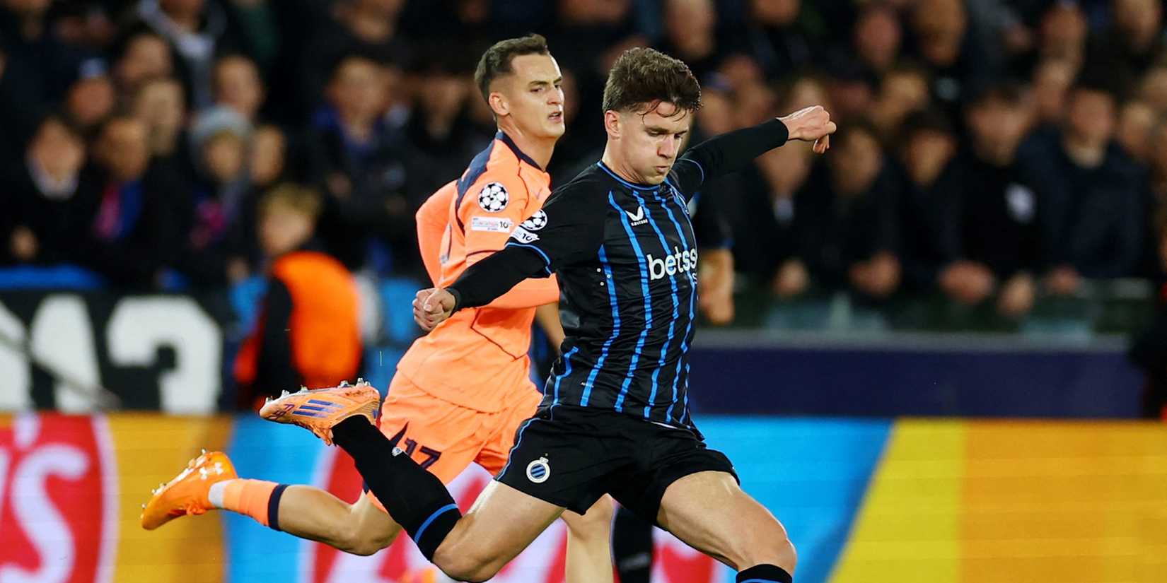 Club Brugge's Kyriani Sabbe in action with FC Barcelona's Marc Casado 