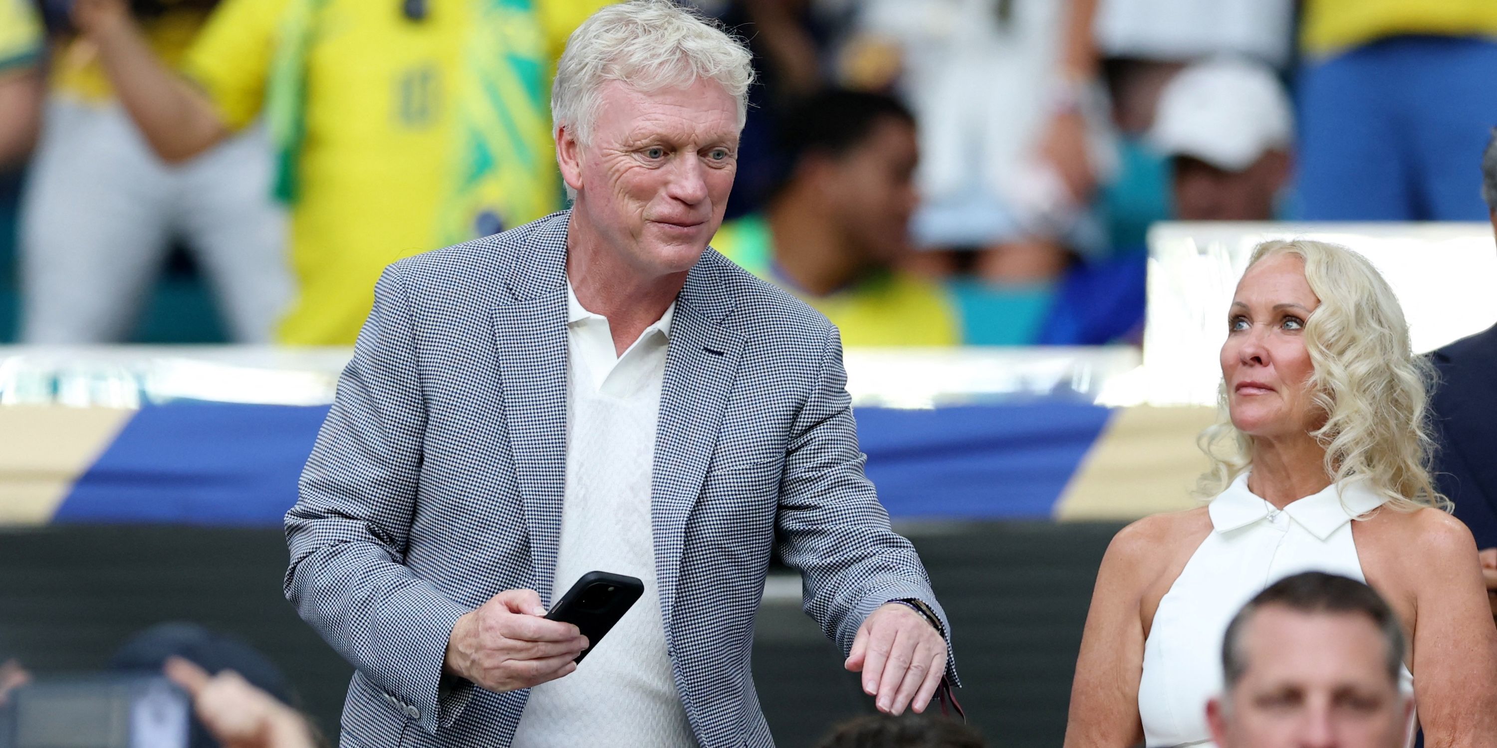 Everton coach, David Moyes, is in the stands before the game