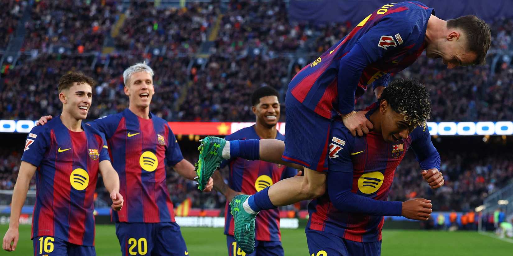 FC Barcelona's Lamine Yamal celebrates scoring their second goal with FC Barcelona's Marc Casado, FC Barcelona's Dani Olmo, FC Barcelona's Fermin Lopez and FC Barcelona's Marcus Rashford