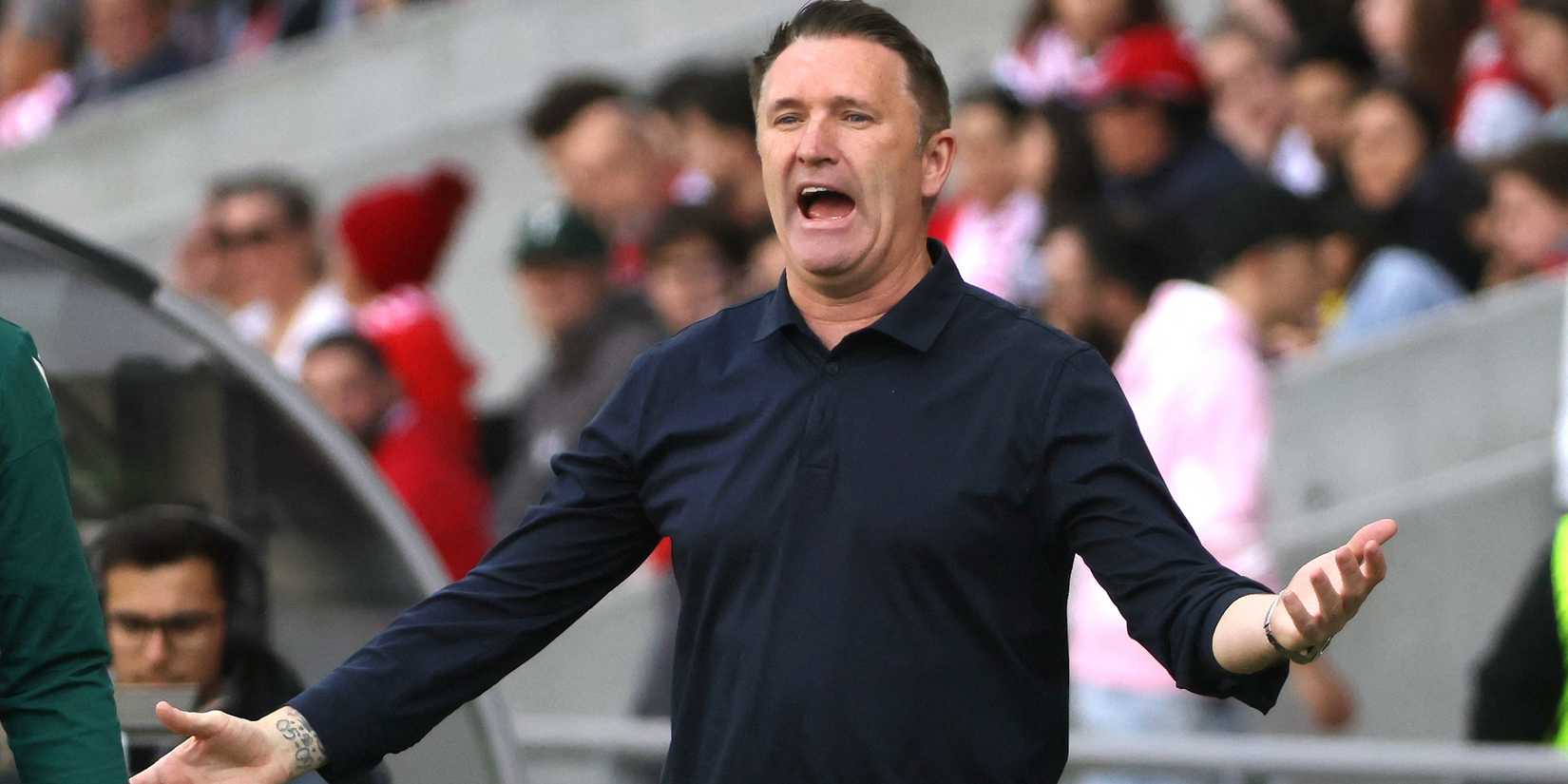 Ferencvaros coach Robbie Keane reacts 