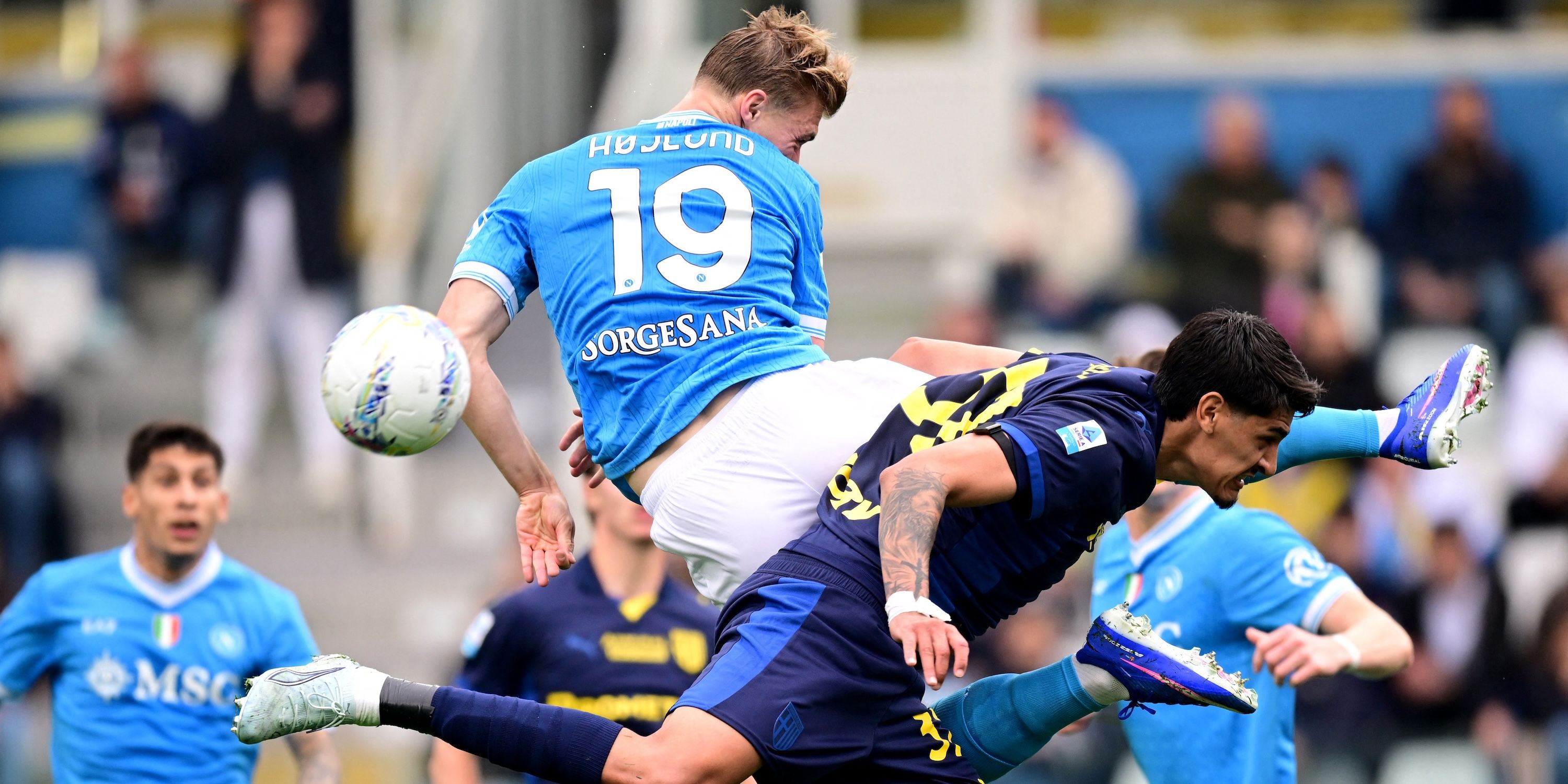 Napoli's Rasmus Hojlund in action with Parma's Mariano Troilo