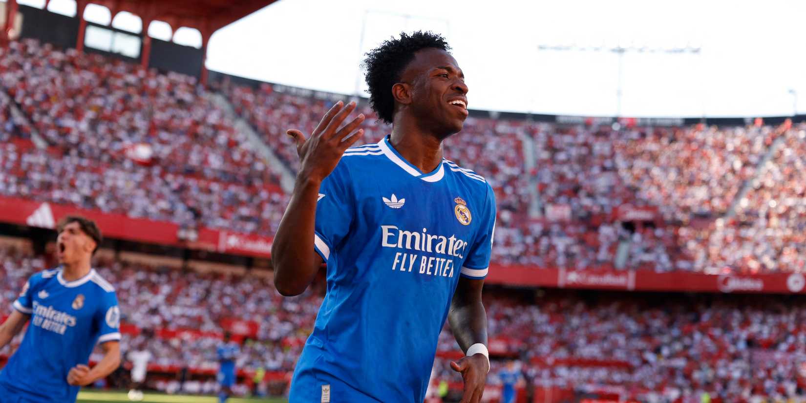 Real Madrid's Vinicius Junior celebrates scoring their first goal with Kylian Mbappe