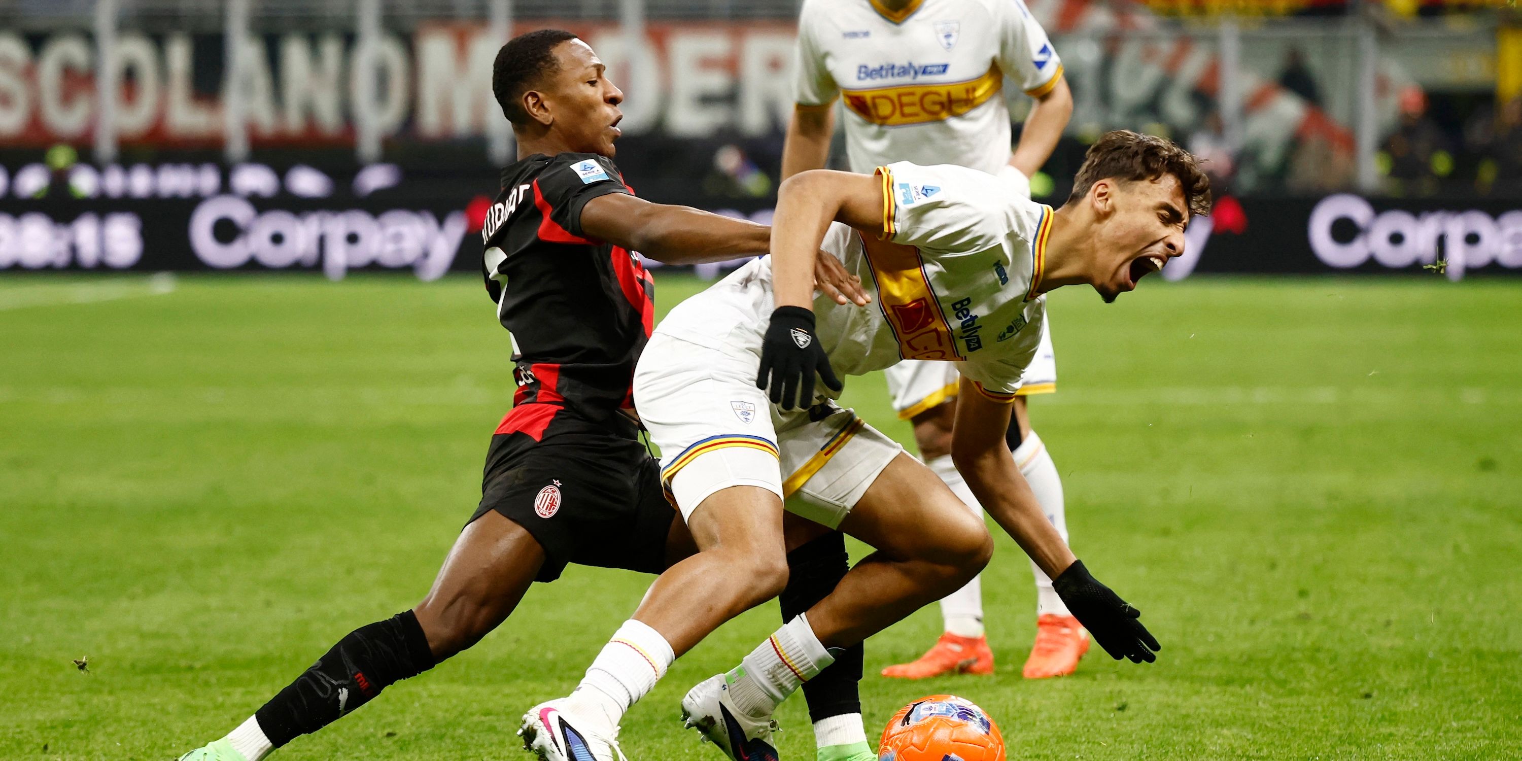 AC Milan's Pervis Estupinan in action with Lecce's Tiago Gabriel