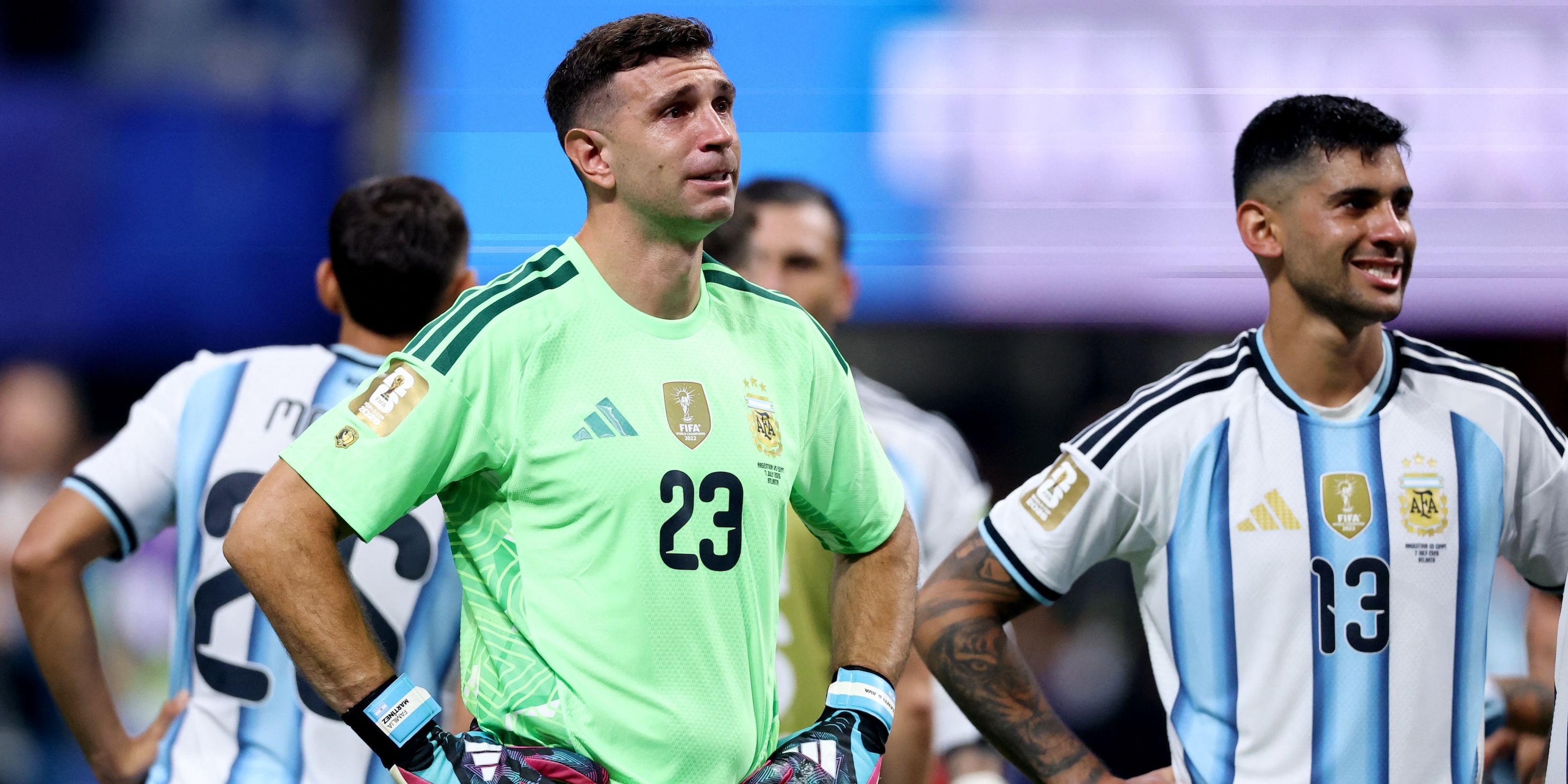 Argentina's Emiliano Martinez and Cristian Romero celebrate