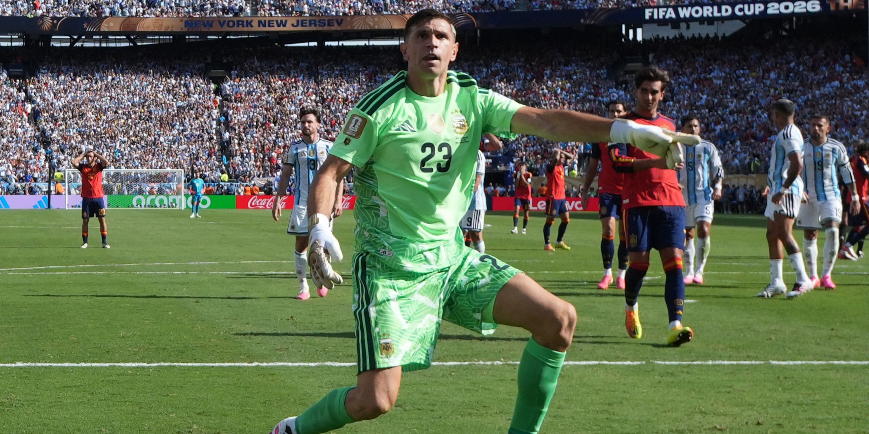 Argentina's Emiliano Martinez reacts after saving a shot on goal by Spain's Lamine Yamal from a free-kick