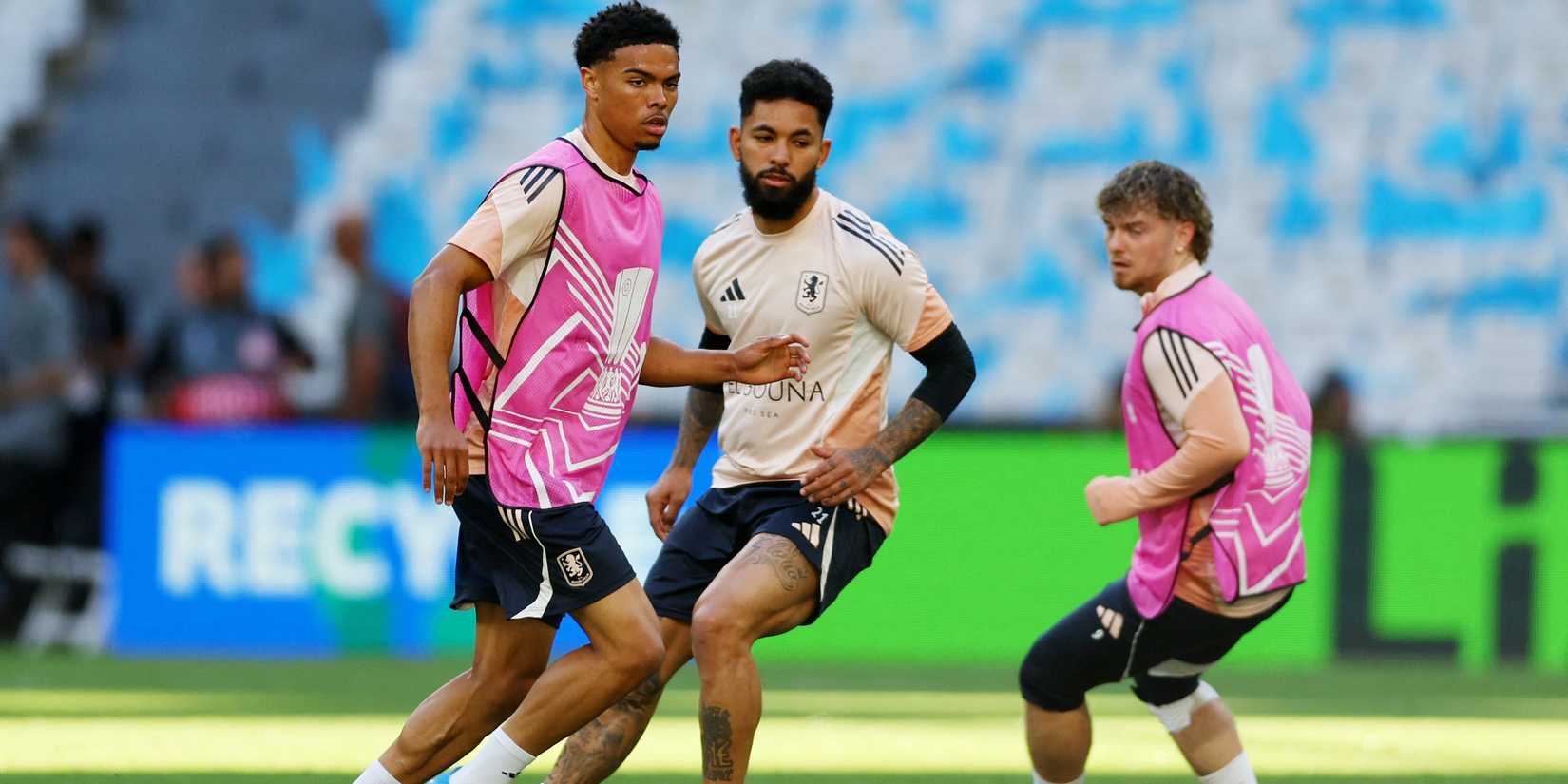 Aston Villa's George Hemmings, Douglas Luiz and Harvey Elliott during training