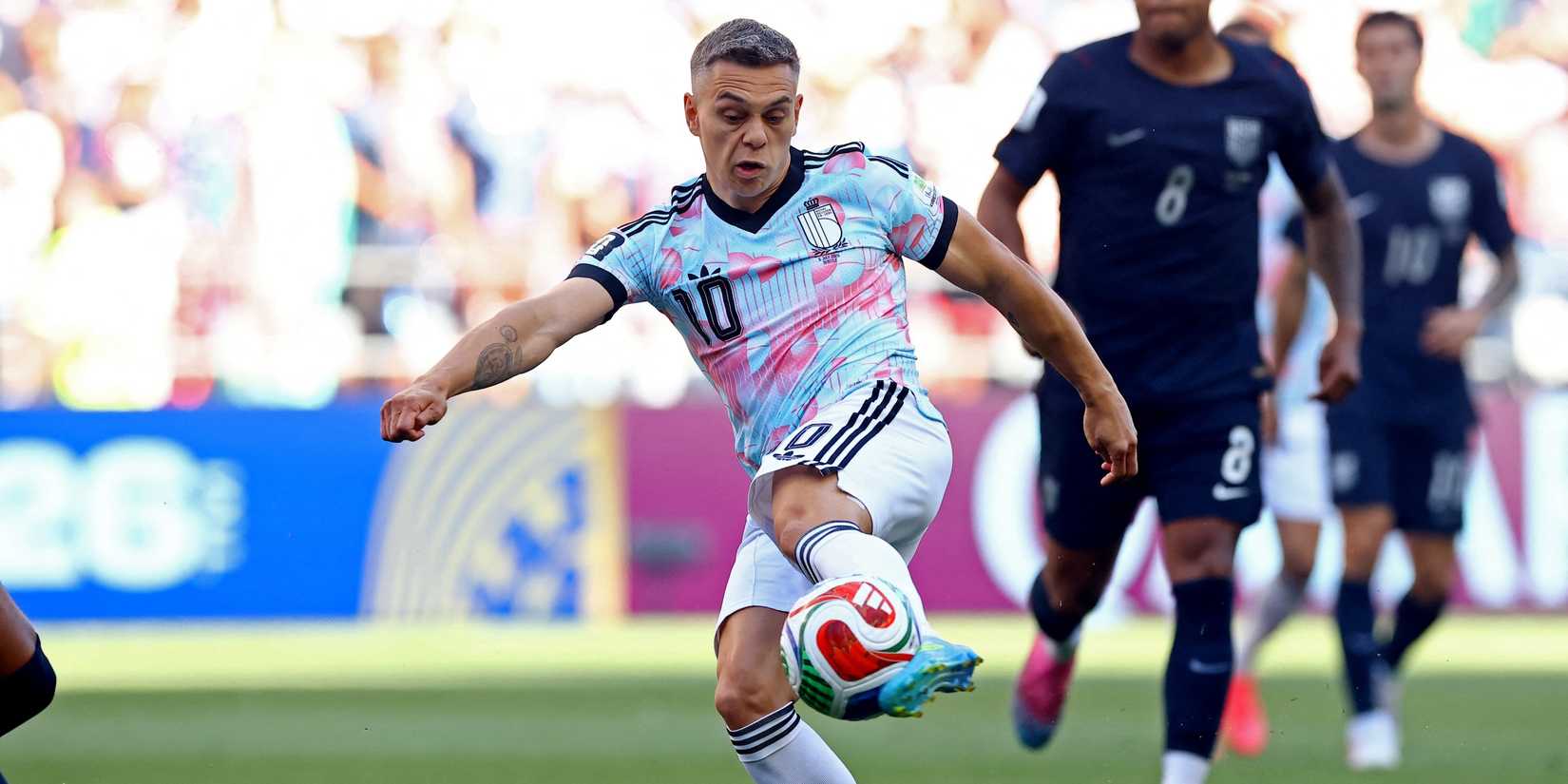 Belgium's Leandro Trossard shoots at goal 