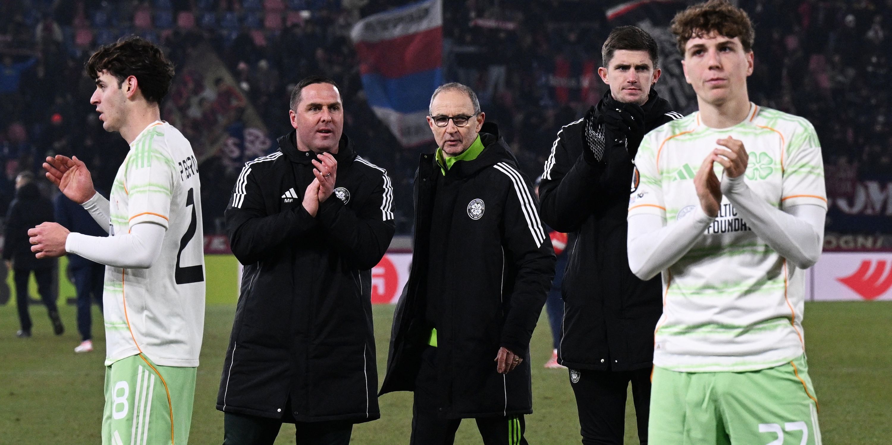 Celtic's Arne Engels applauds fans after the match alongside Celtic interim manager Martin O'Neill 