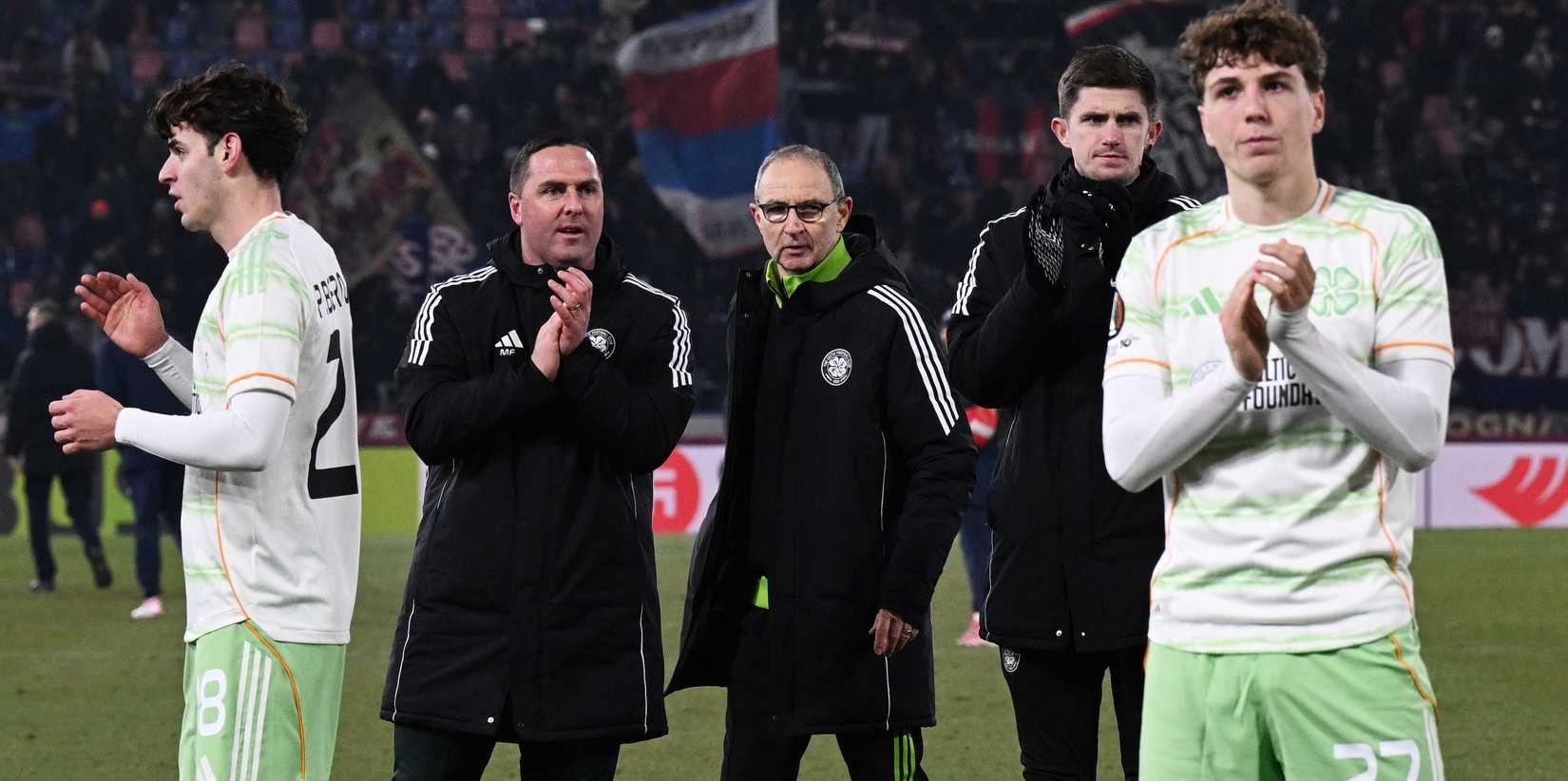 Celtic's Arne Engels applauds fans after the match alongside Celtic interim manager Martin O'Neill 