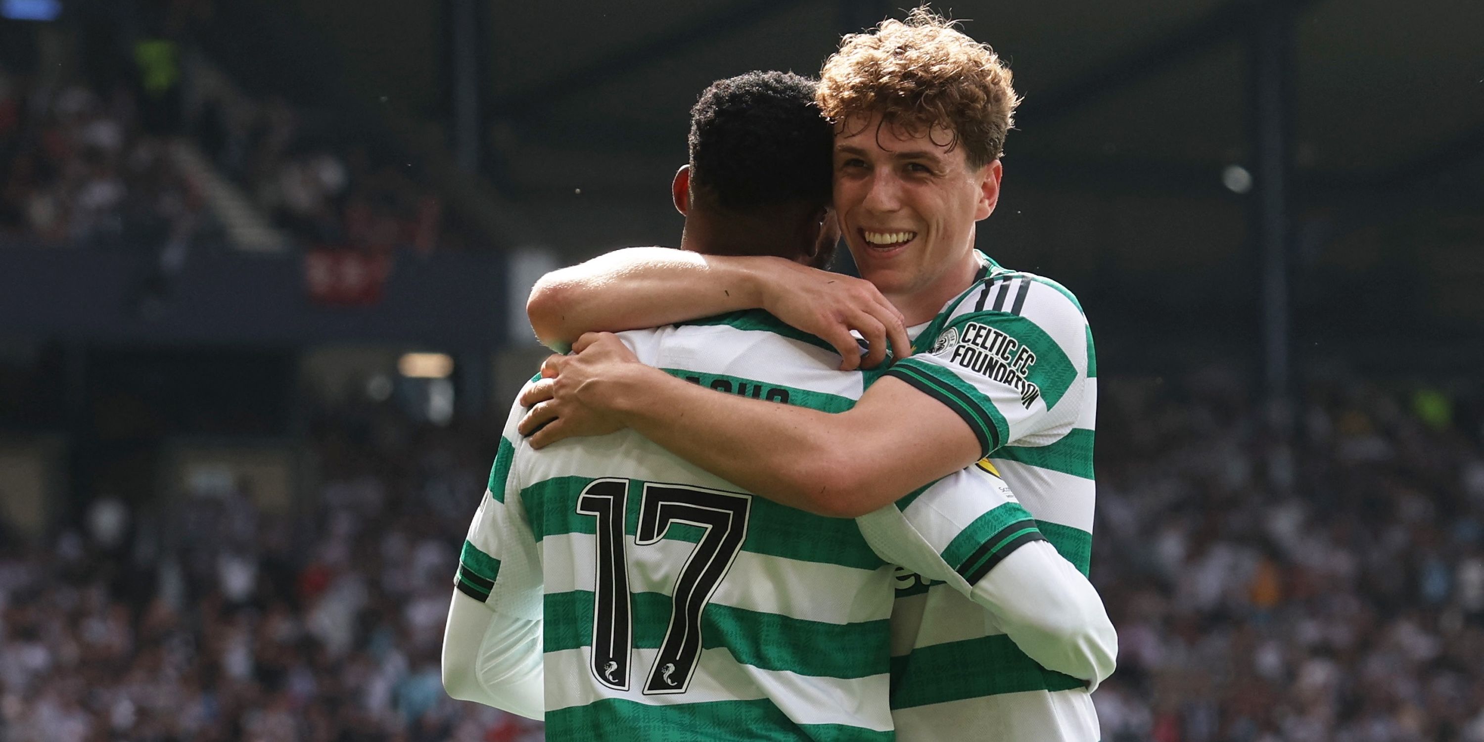 Celtic's Kelechi Iheanacho celebrates scoring their third goal with Arne Engels