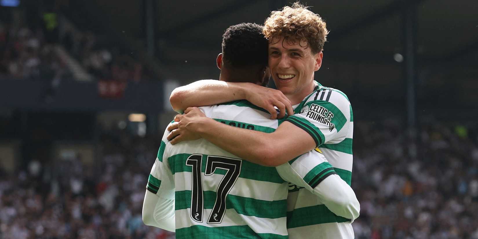 Celtic's Kelechi Iheanacho celebrates scoring their third goal with Arne Engels