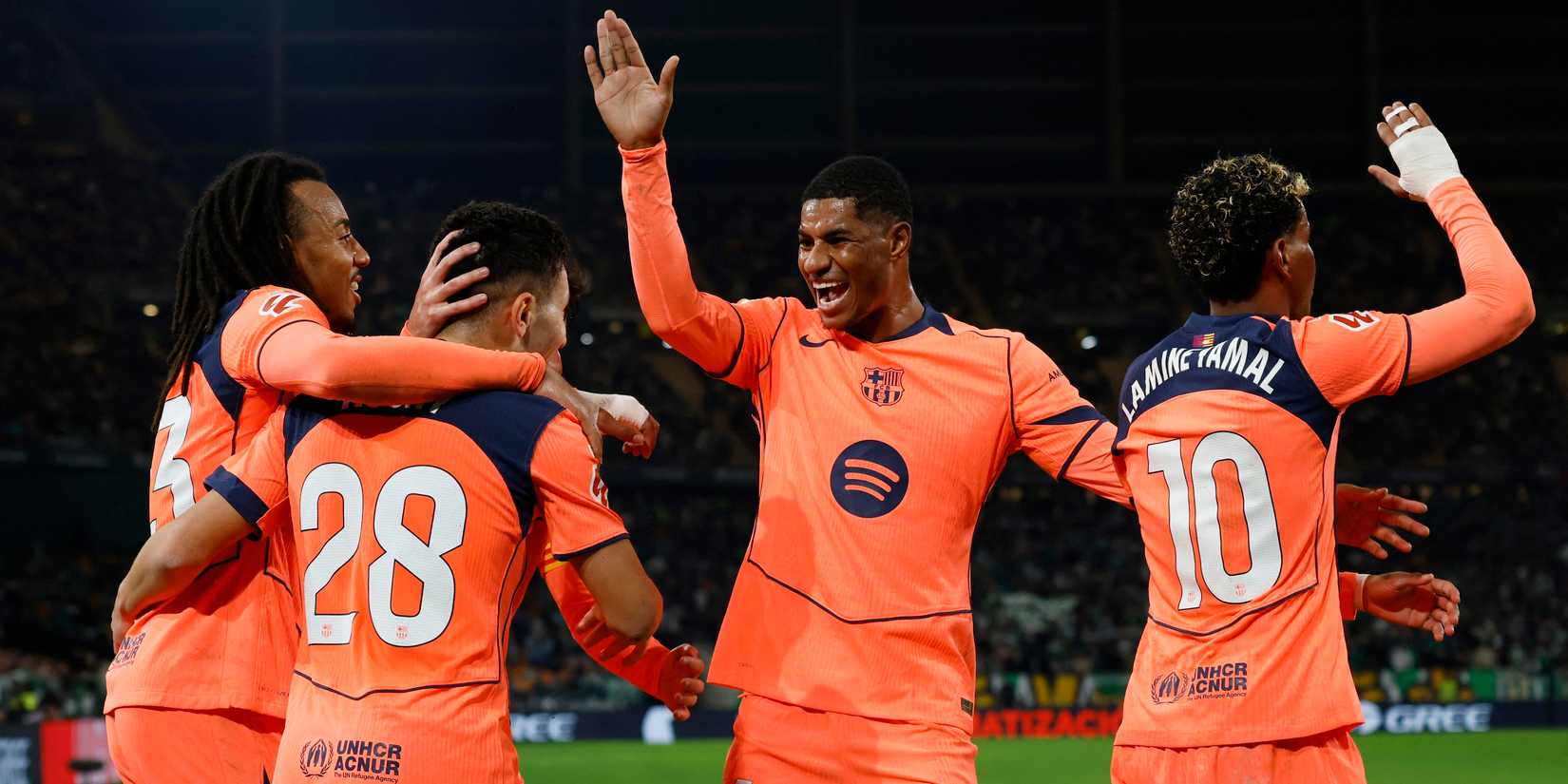     FC Barcelona's Roony Bardghji celebrates scoring his third goal with Marcus Rashford, Jules Kounde and Lamine Yamal