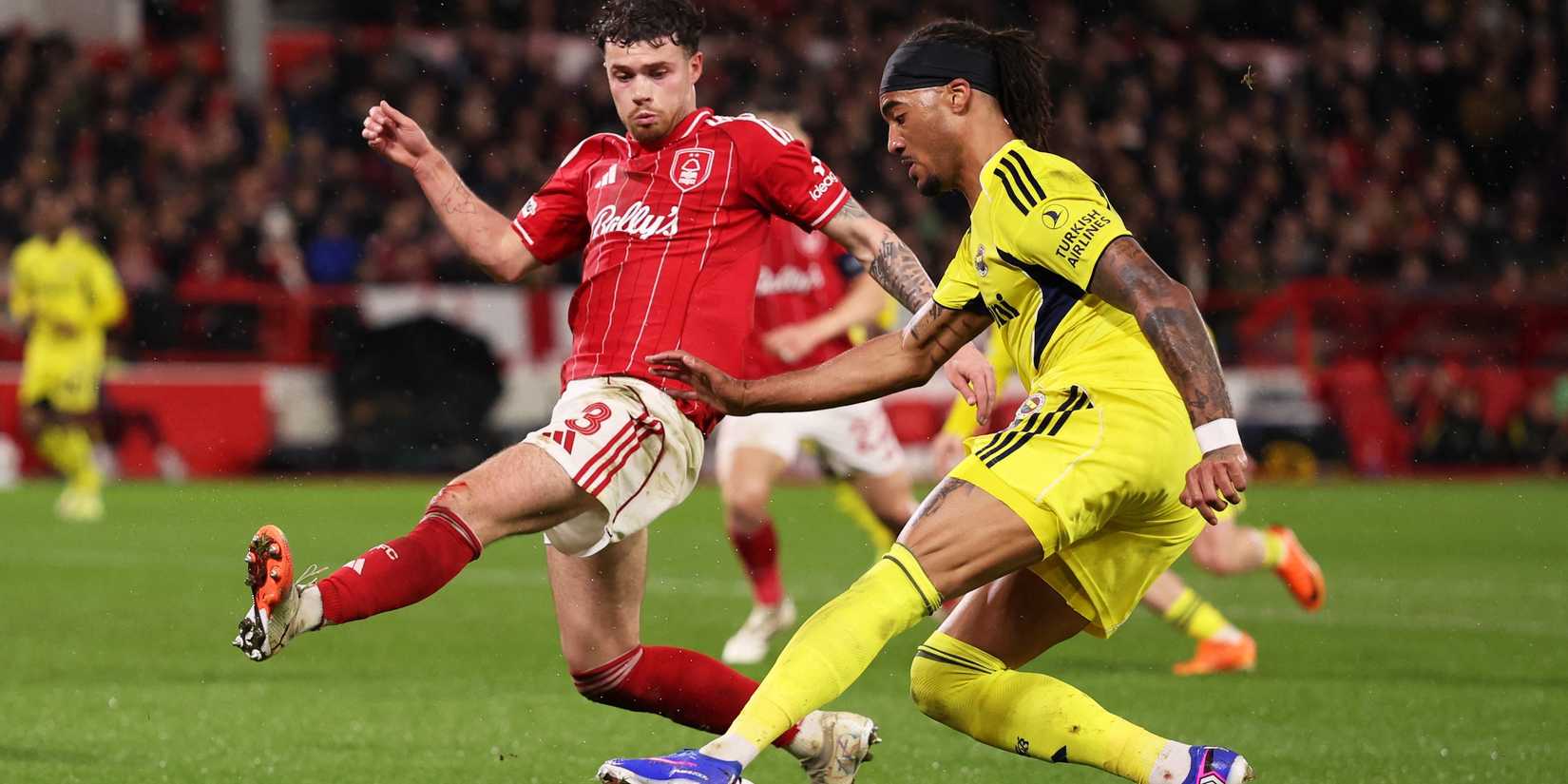 Fenerbahce's Archie Brown in action with Nottingham Forest's Neco Williams