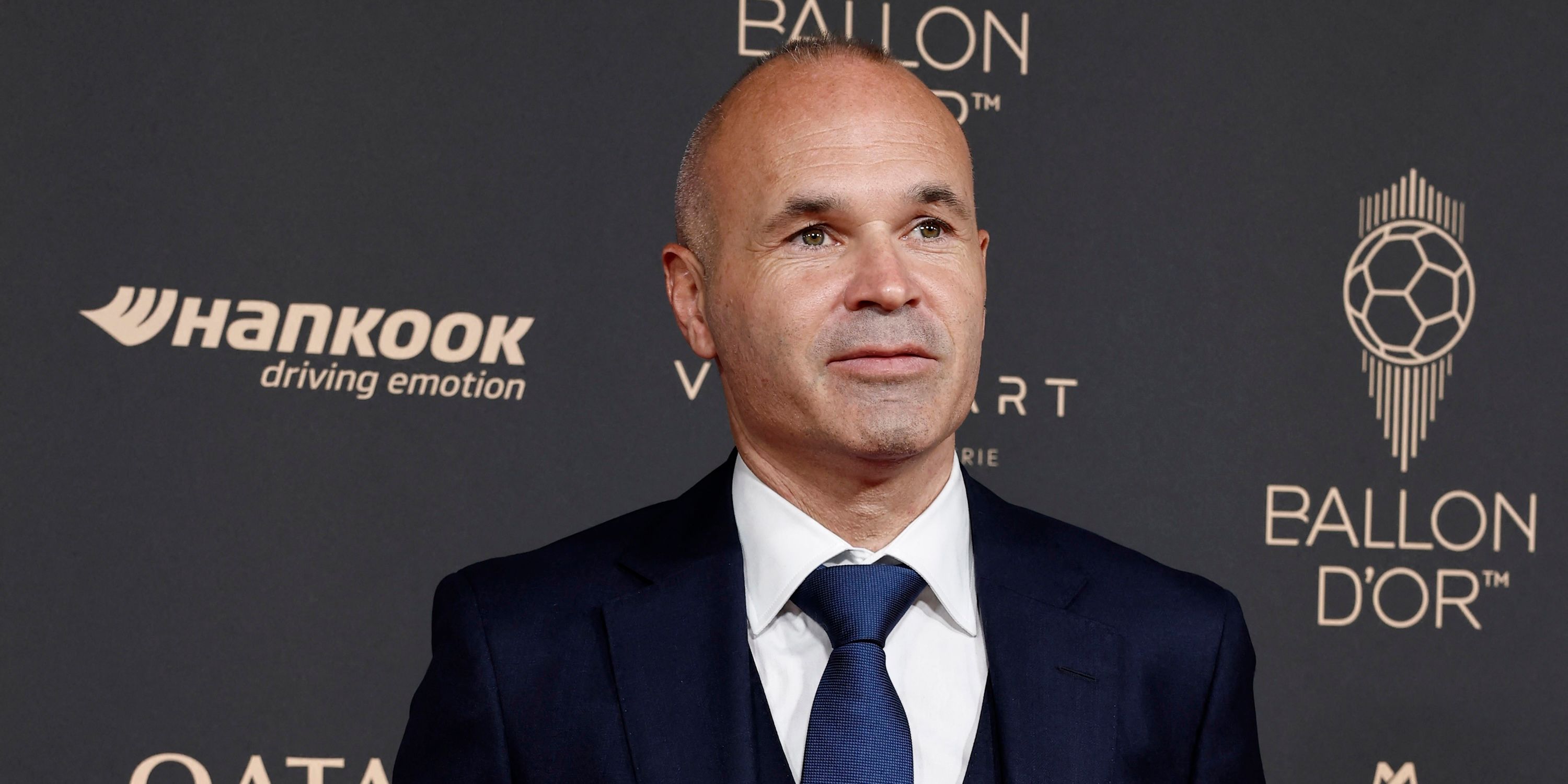 Former footballer Andres Iniesta poses for a photo