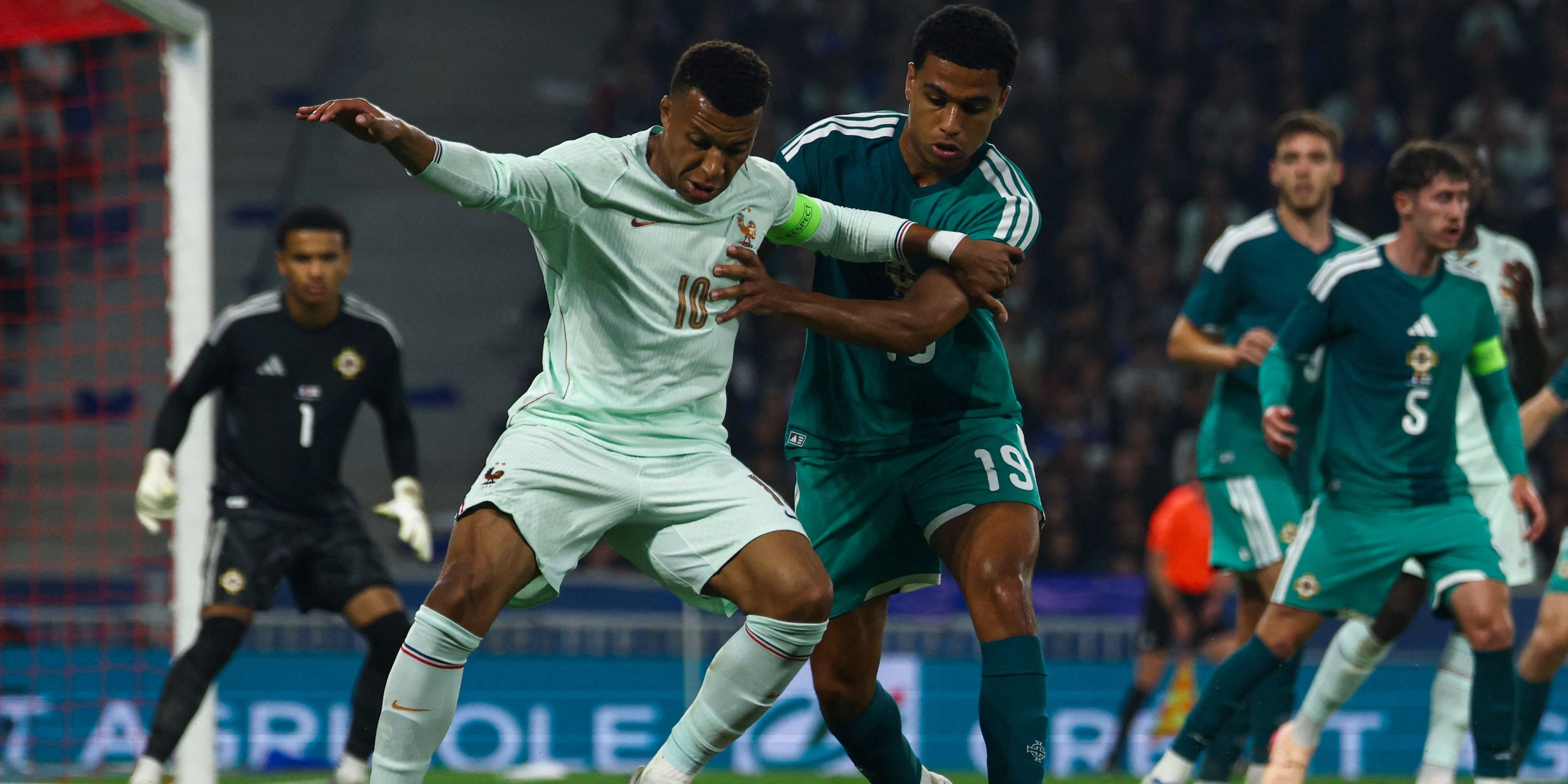 France's Kylian Mbappe in action with Northern Ireland's Shea Charles 