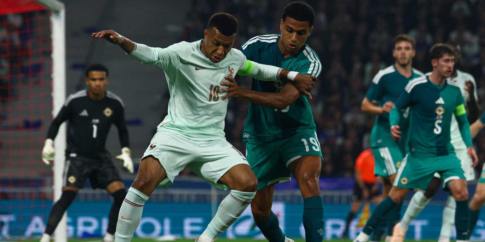 France's Kylian Mbappe in action with Northern Ireland's Shea Charles 