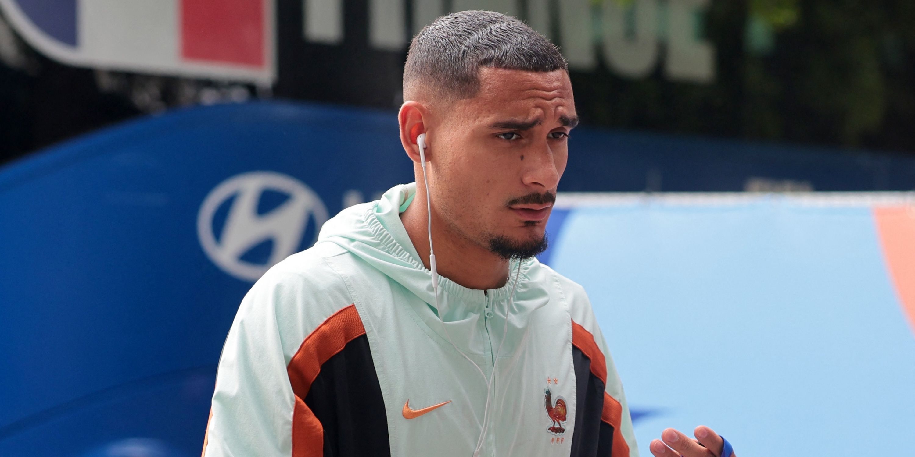 France's Maxence Lacroix arrives at the stadium before the match