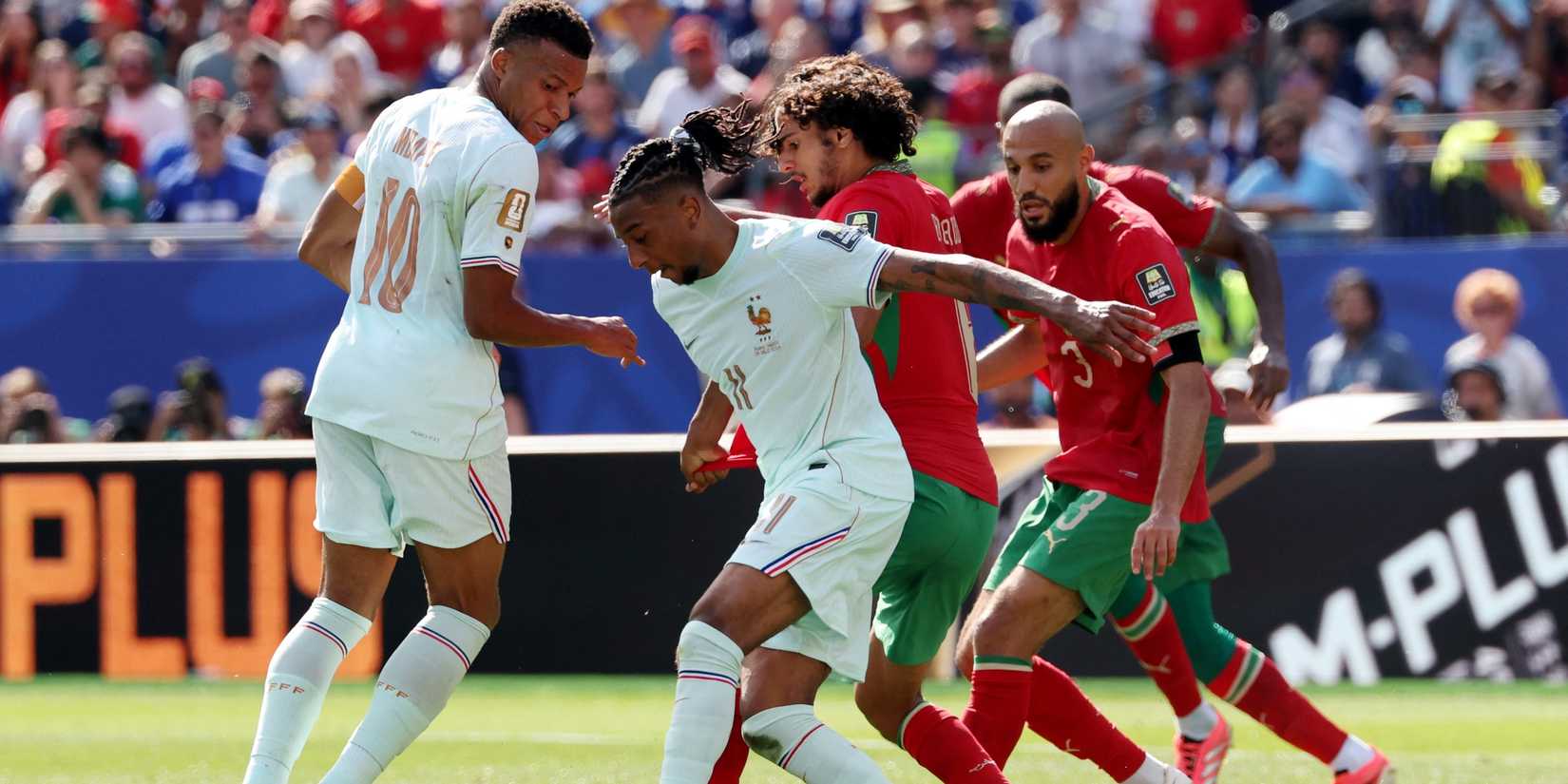 France's Michael Olise in action with Morocco's Ayyoub Bouaddi 