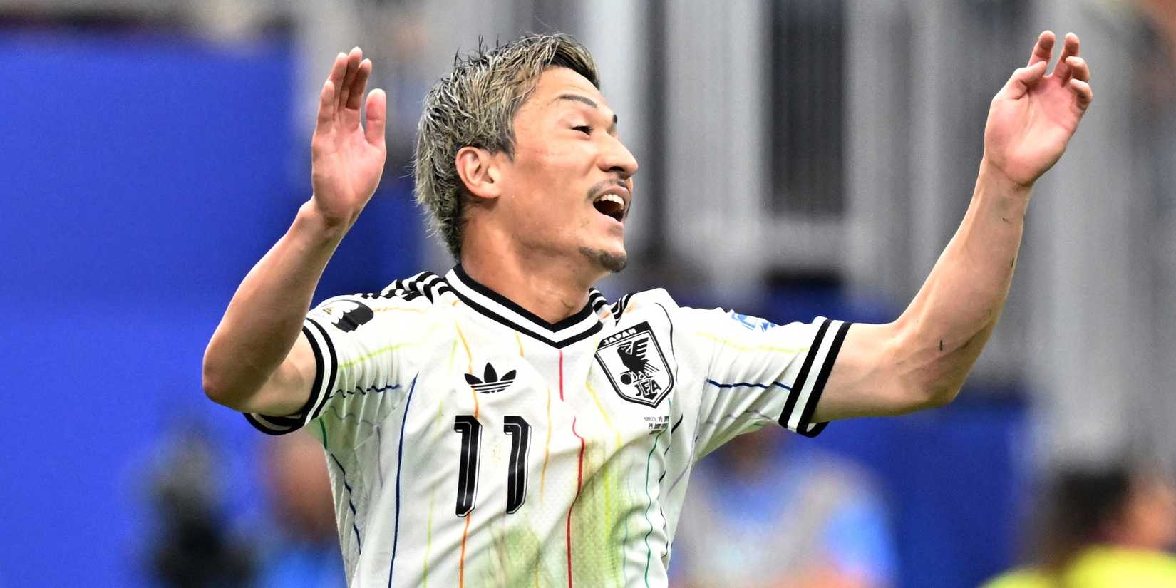 Japan's Daizen Maeda reacts