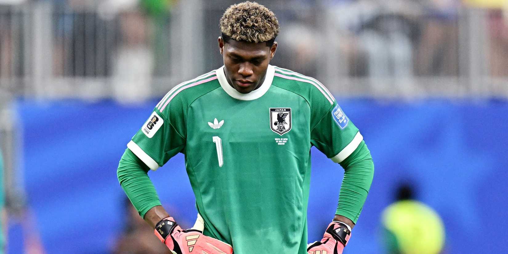 Japan's Zion Suzuki reacts after the match