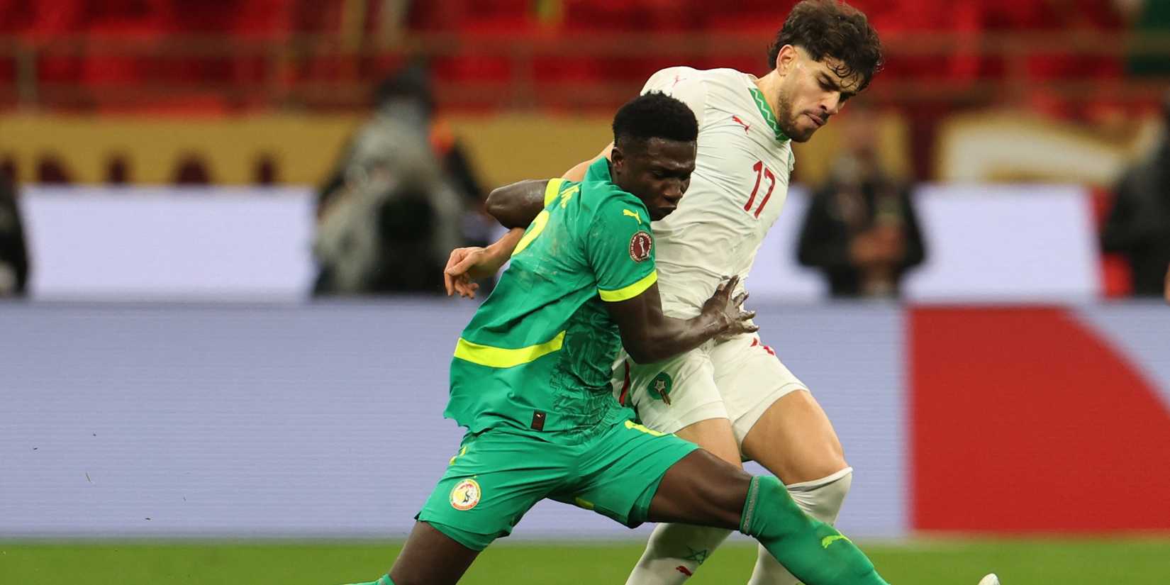 Morocco's Abde Ezzalzouli in action with Senegal's Lamine Camara