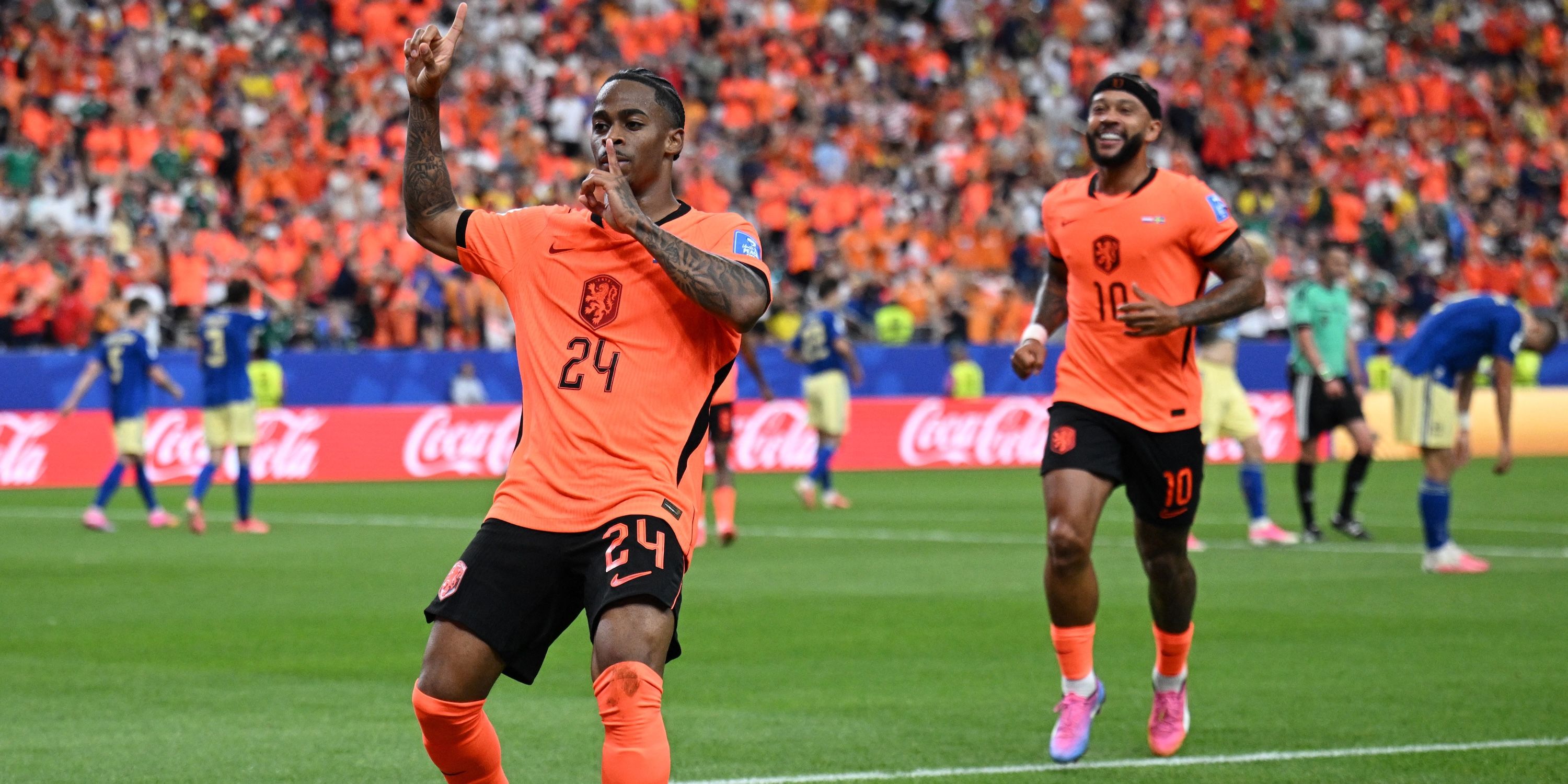Netherlands' Crysencio Summerville celebrates scoring their fifth goal -1