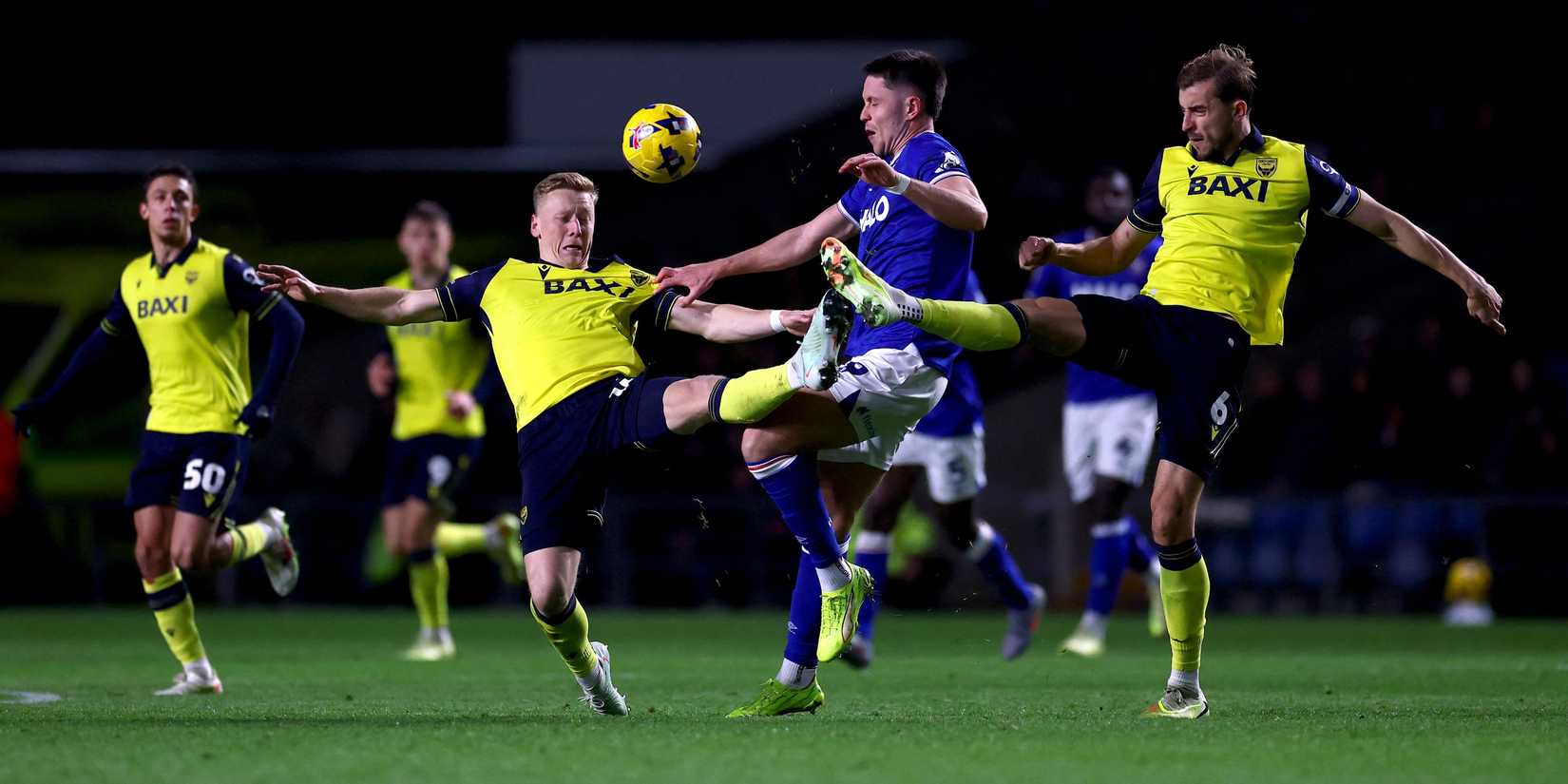 Oxford United's Brian De Keersmaecker and Michal Helik in action with Ipswich Town's George Hirst
