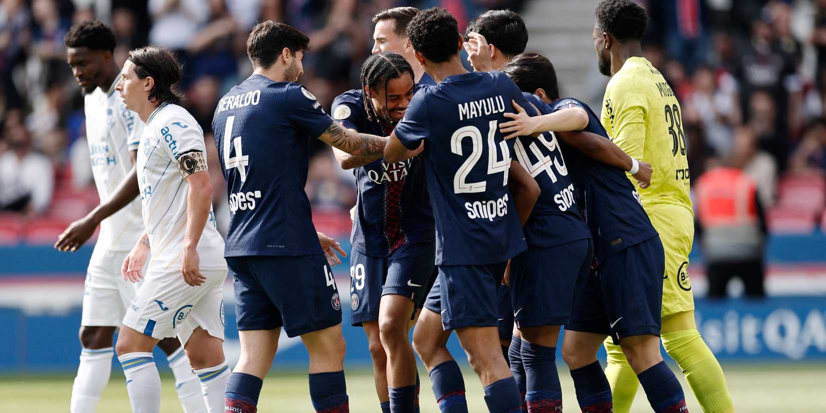 Paris St Germain's Ibrahim Mbaye celebrates scoring their first goal with teammates