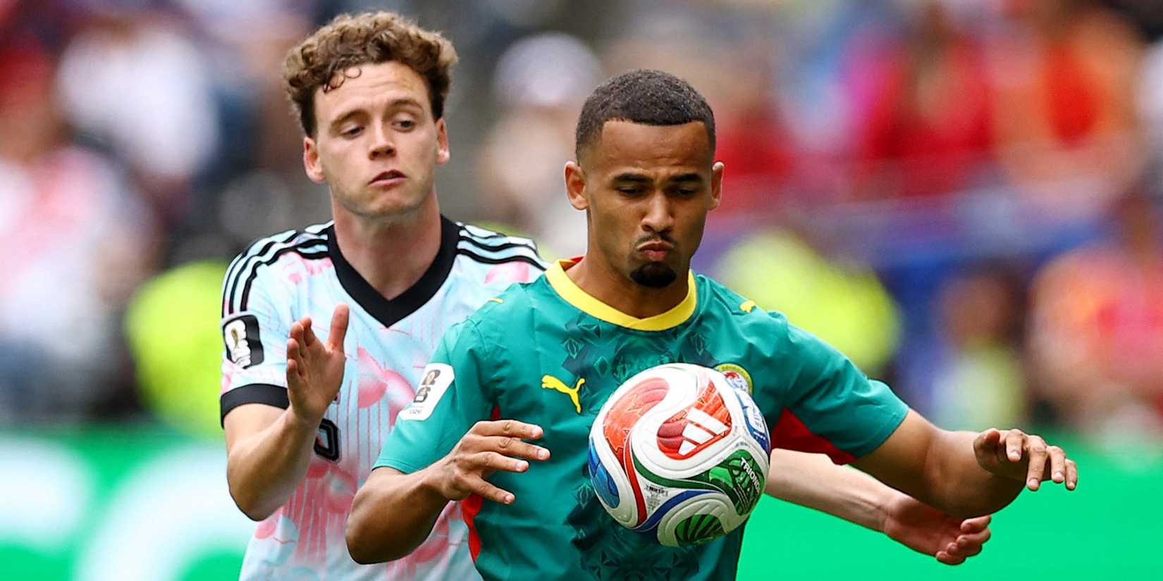 Senegal's Iliman Ndiaye in action with Belgium's Maxim De Cuyper