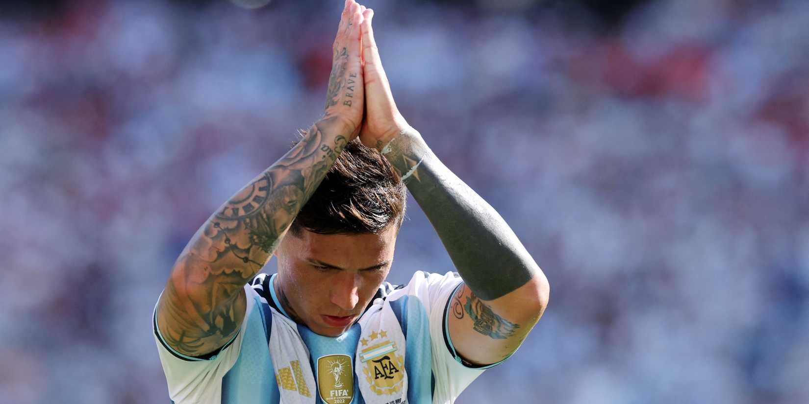 Argentina's Enzo Fernandez looks dejected as he walks off the pitch after being shown a red card by the referee