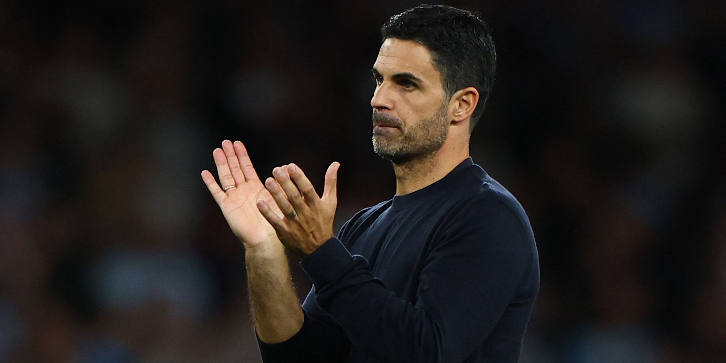 Arsenal manager Mikel Arteta applauds fans after the match