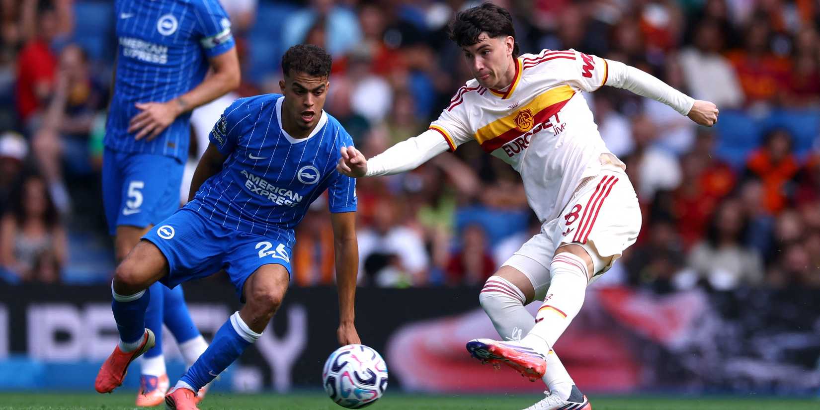 Brighton and Hove Albion's Yasin Ayari in action with AS Roma's Matias Soule 