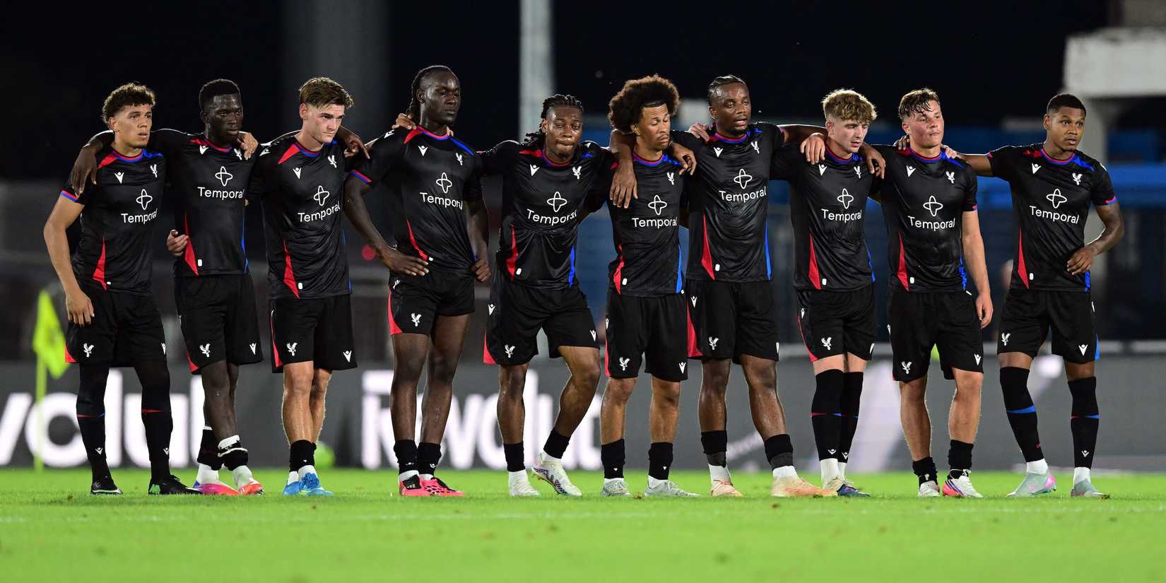 Crystal Palace players line up during a penalty shootout