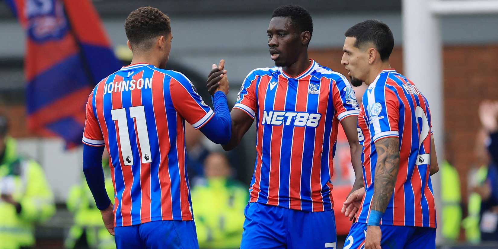 Crystal Palace's Ismaila Sarr celebrates scoring their first goal with Brennan Johnson and Daniel Munoz