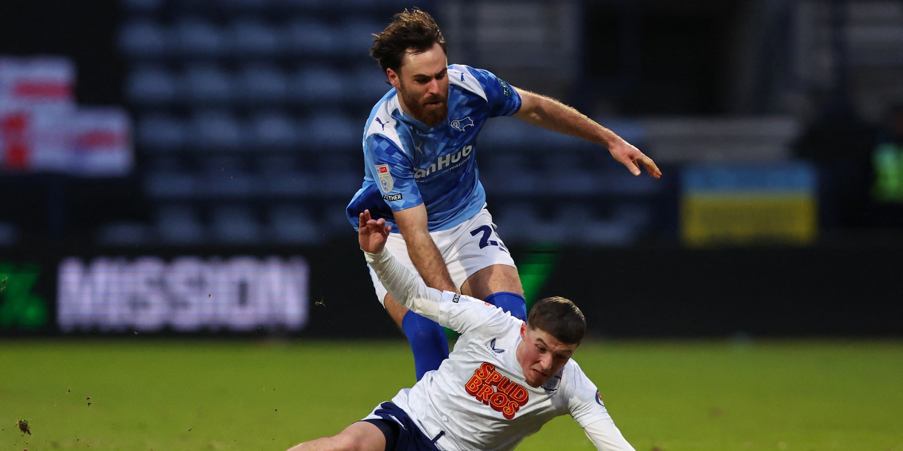 Derby County's Ben Brereton Diaz fouls Preston North End's Alfie Devine and receives a yellow card