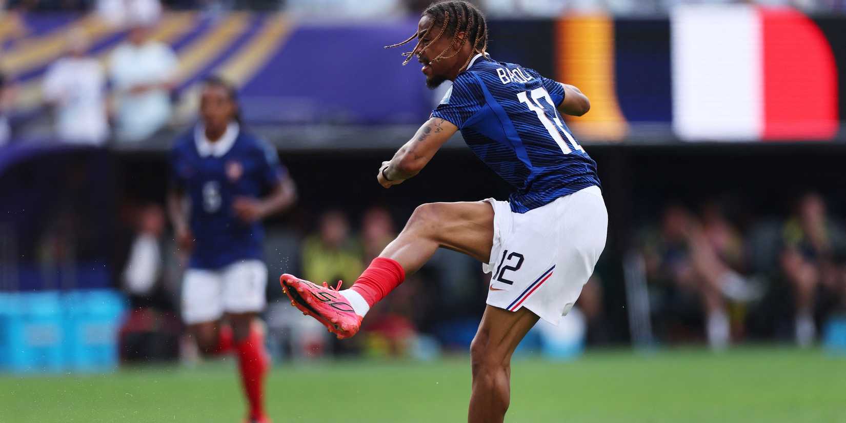 France's Bradley Barcola scores their second goal 