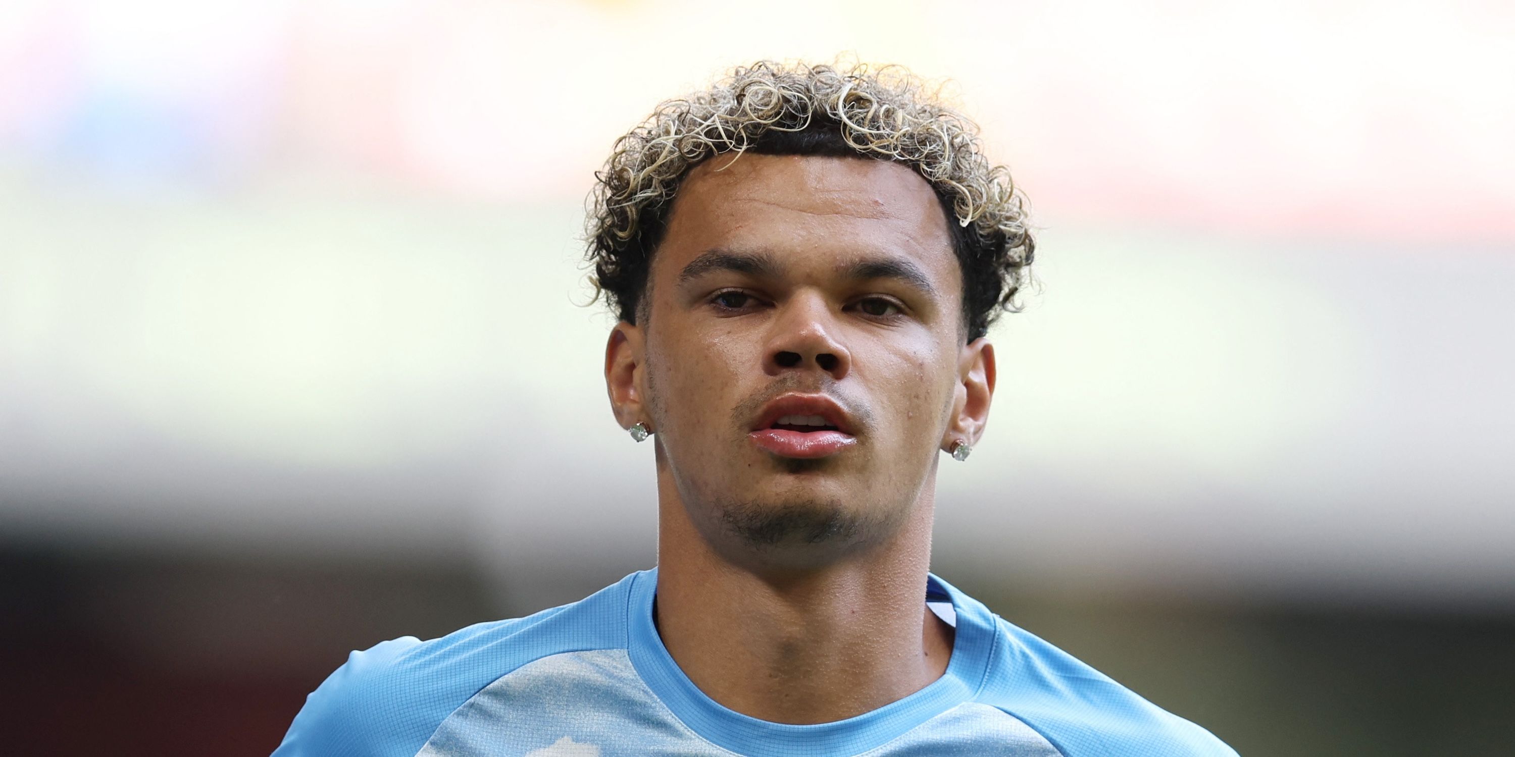 Manchester City's Nico O'Reilly during the warm up before the match