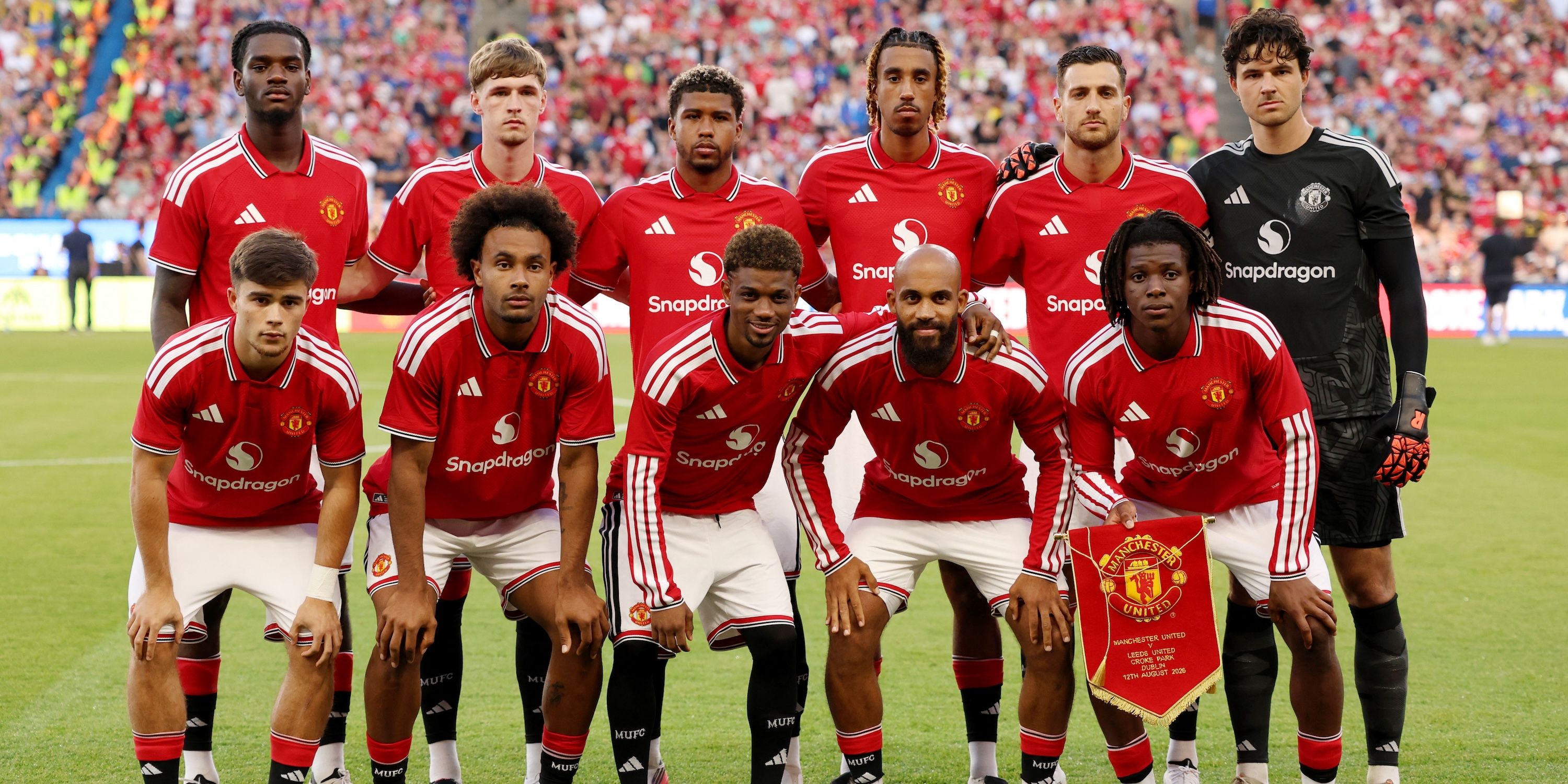 Manchester United players pose for a team group photo before the match