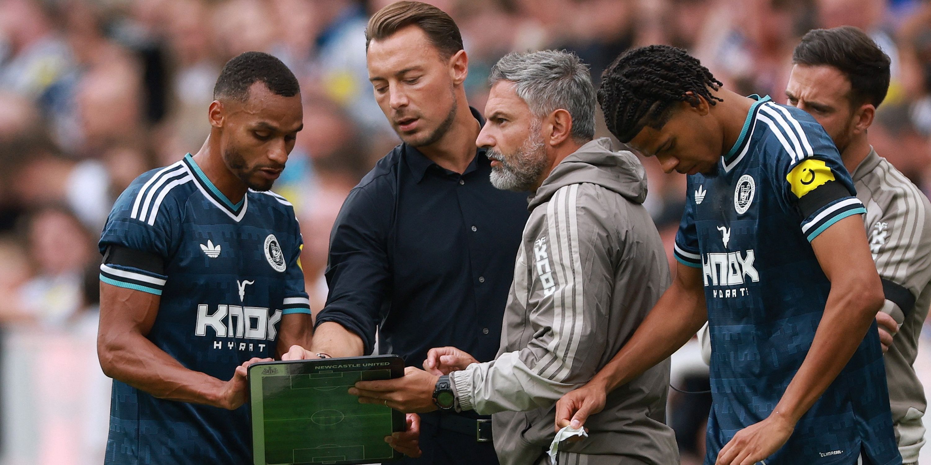 Newcastle United manager Matthias Jaissle gives instructions to his player Jacob Murphy during the match