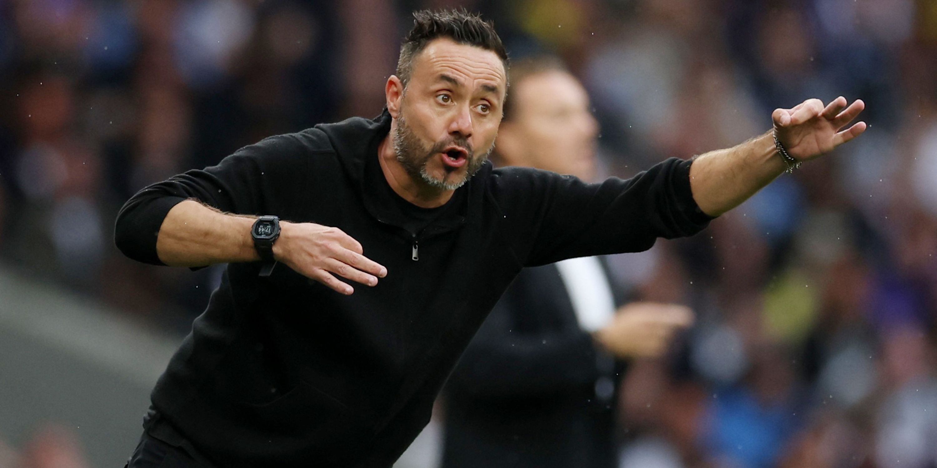 Tottenham Hotspur manager Roberto De Zerbi reacts